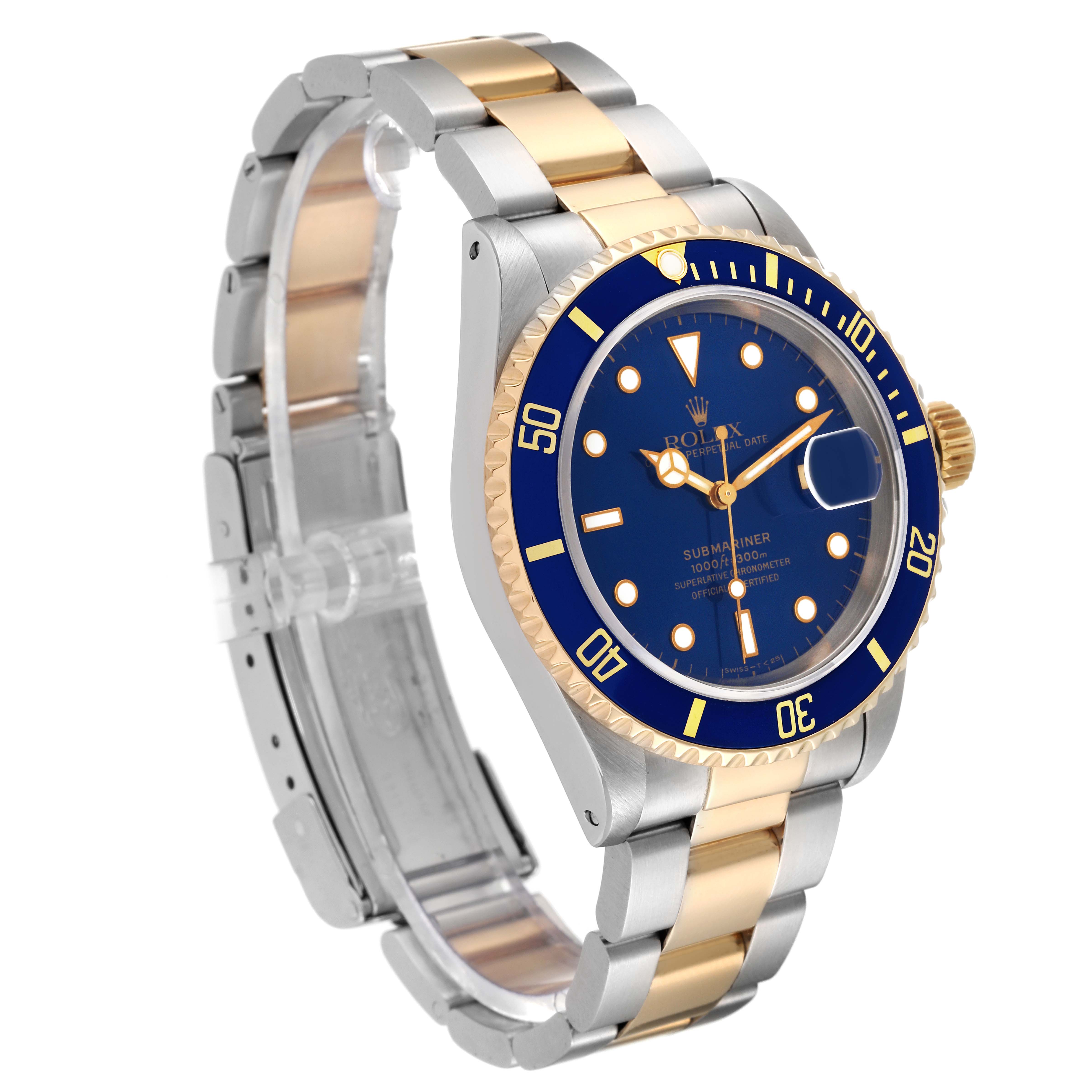 This image shows the Rolex Submariner 16613 Men's Steel and Gold (two tone) Blue Dial 16613 Men's Steel and Gold (two tone) Blue Dial watch at a three-quarter angle highlighting the blue dial, bezel, and two-tone bracelet.