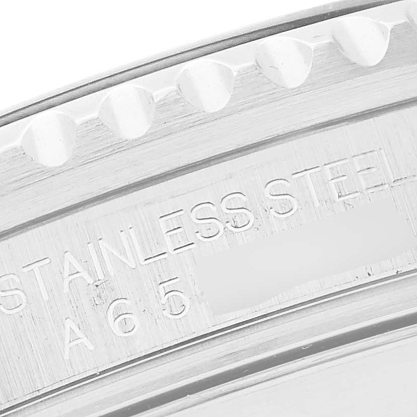 This close-up image shows the engraved text on the stainless steel case back of a Rolex Submariner 16610 Men
s Stainless Steel Black Dial 16610 Men
s Stainless Steel Black Dial watch.