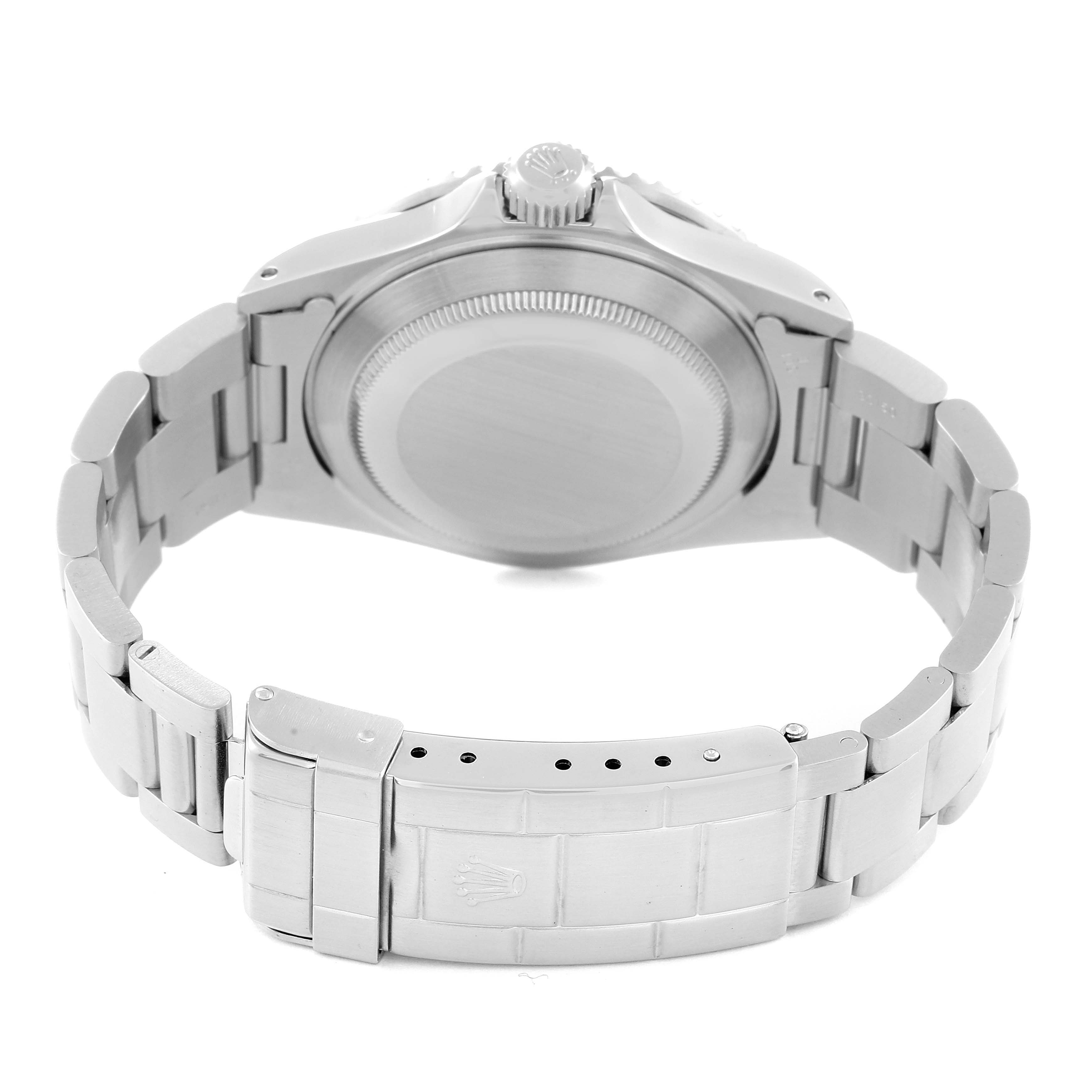 The image shows the back view of a Rolex Submariner 16610 Men
s Stainless Steel Black Dial 16610 Men
s Stainless Steel Black Dial, highlighting its case back, bracelet, and clasp.