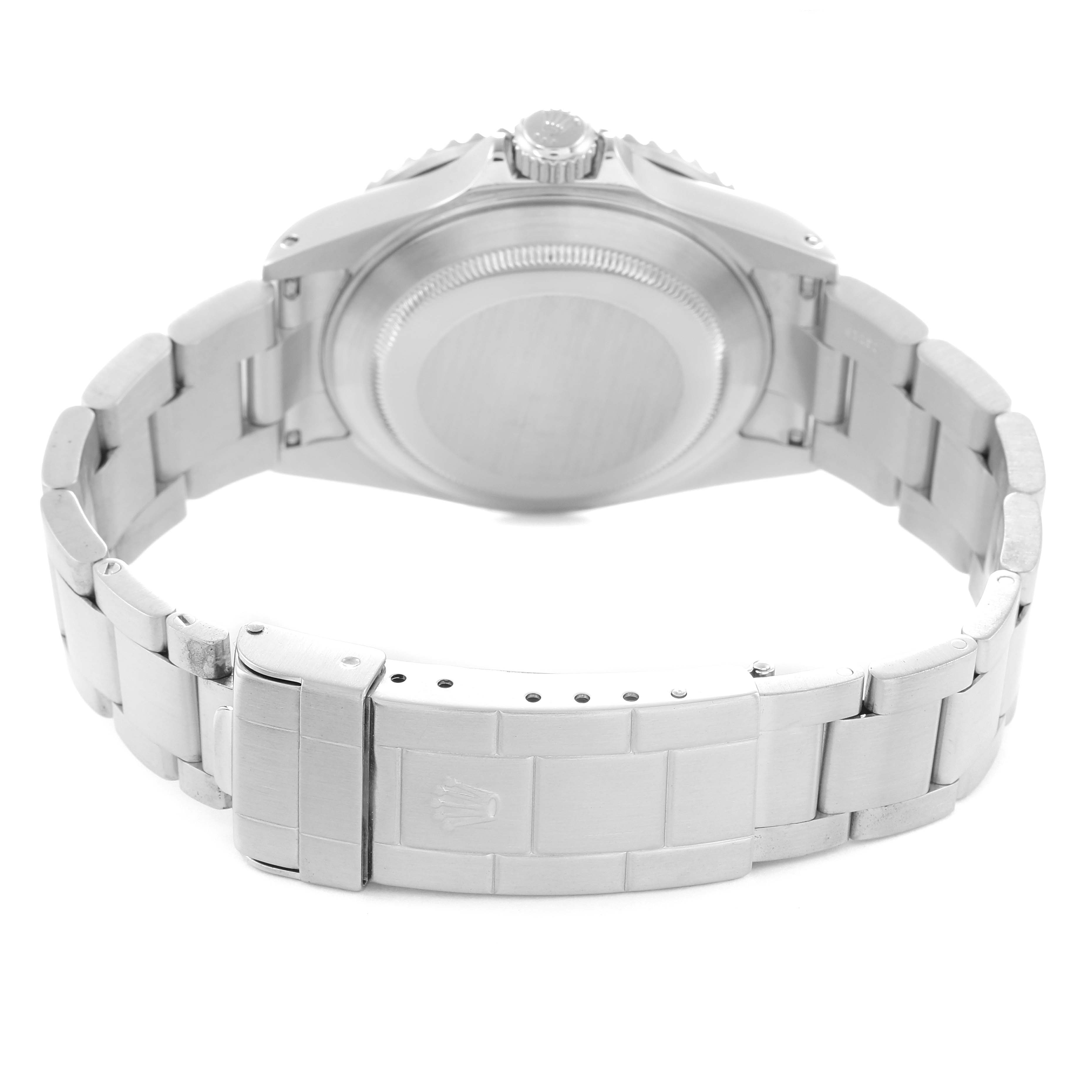 The image shows the back view of the Rolex Submariner model 16610, highlighting the bracelet, clasp, and case back.