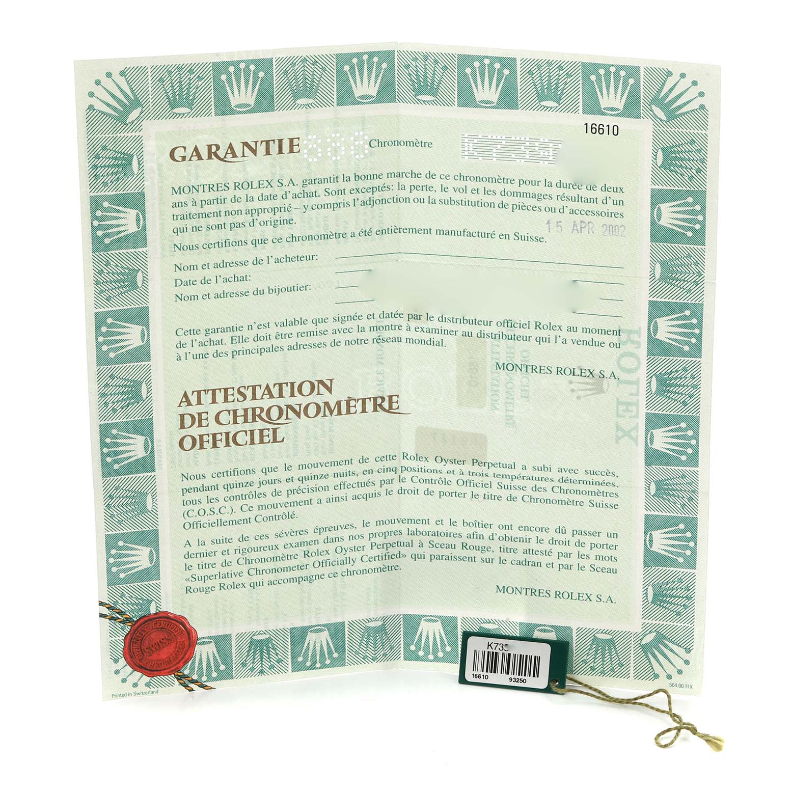 The image shows a warranty paper for a Rolex Submariner, model number 16610, laid flat, featuring green border designs and a red seal.