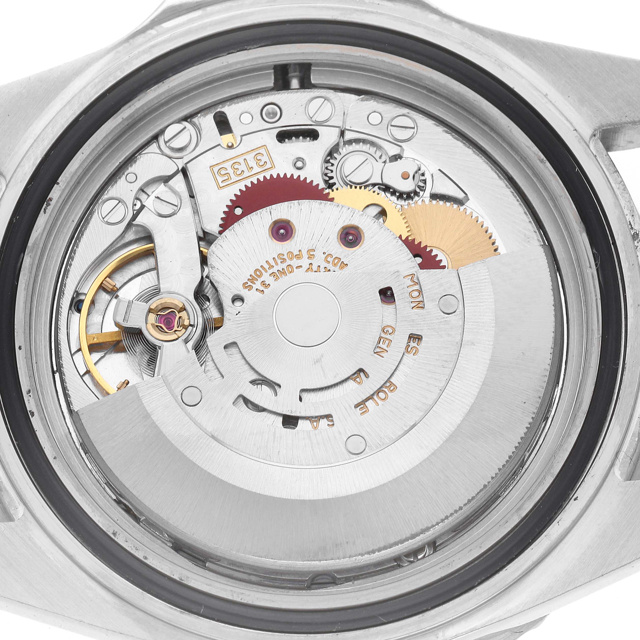 The image shows the internal movement of a Rolex Submariner model 16610 men
s watch, viewed from the back, highlighting its mechanical components and design details.