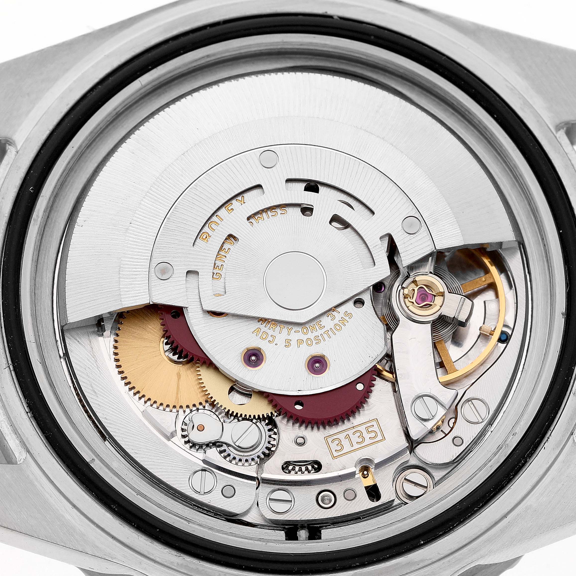 The image shows the movement and internal mechanisms of a Rolex Submariner 16610 Men's Stainless Steel Black Dial model watch.