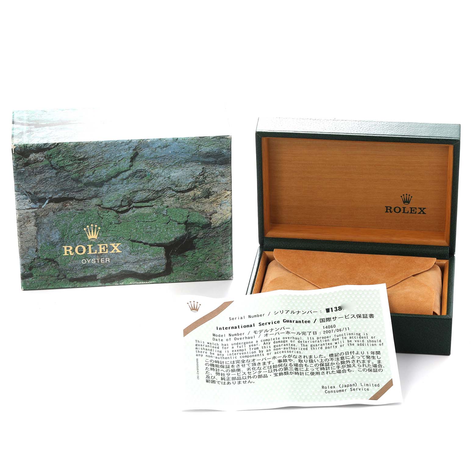 The image shows the Rolex Submariner model 14060 packaging, including a green box, an open watch case, and an international service guarantee document.