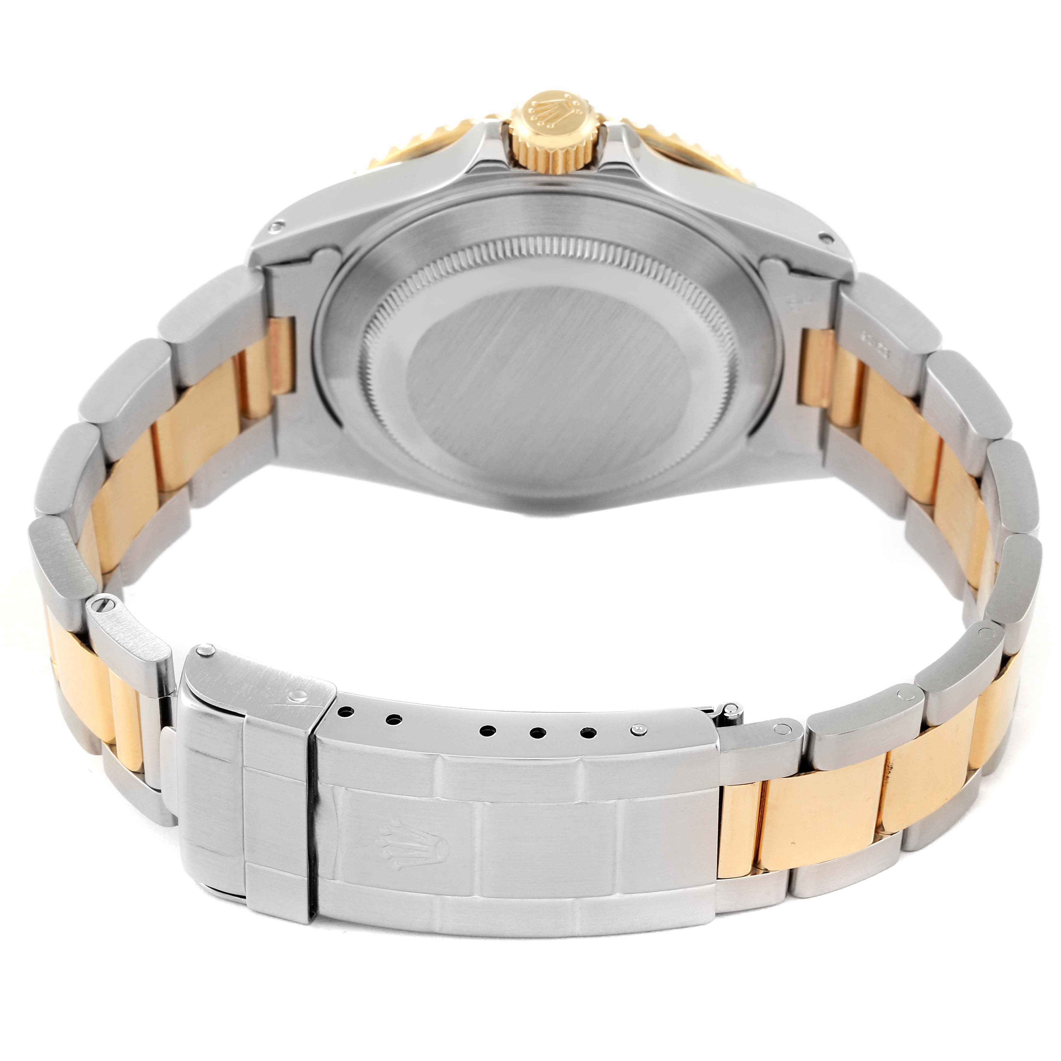 This image shows the back of the Rolex Submariner 16613 Men's Steel and Gold (two tone) Black Dial 16613 Men's Steel and Gold (two tone) Black Dial, highlighting its stainless steel and gold bracelet and the case back.