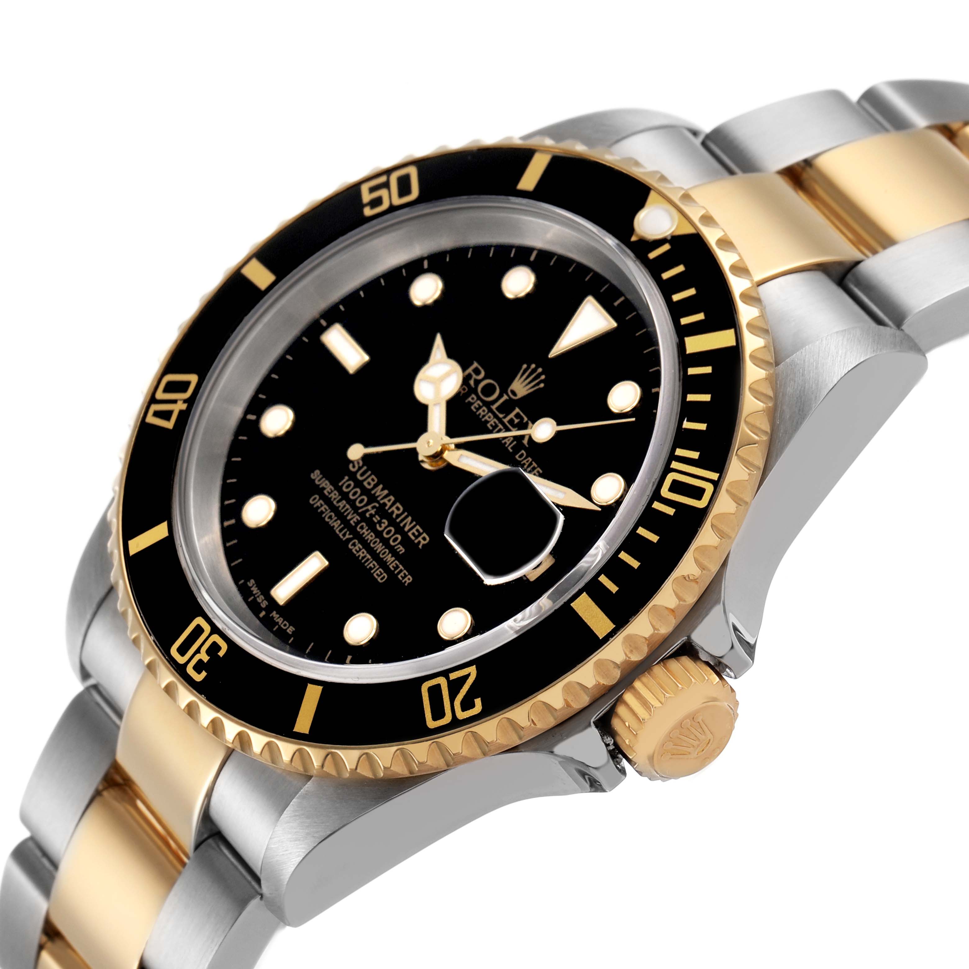 The Rolex Submariner 16613 Men's Steel and Gold (two tone) Black Dial watch is shown at a three-quarter angle, highlighting its bezel, face, and two-tone bracelet.