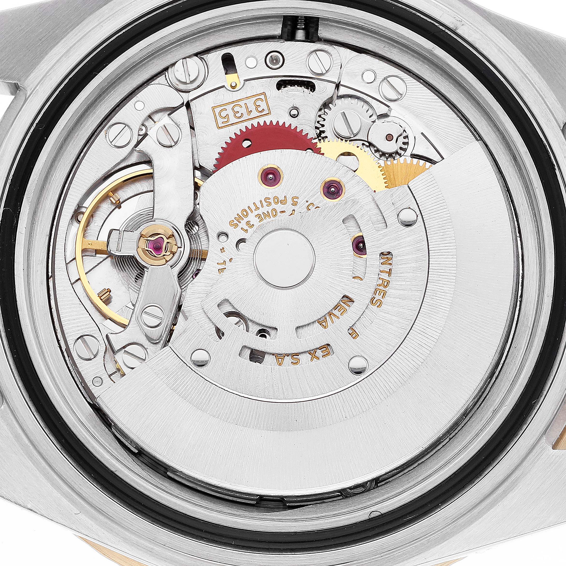 The image shows the intricate internal mechanism and movement parts of a Rolex Submariner 16613 Men's Steel and Gold (two tone) Champagne Dial 16613 Men's Steel and Gold (two tone) Champagne Dial watch viewed from the back.