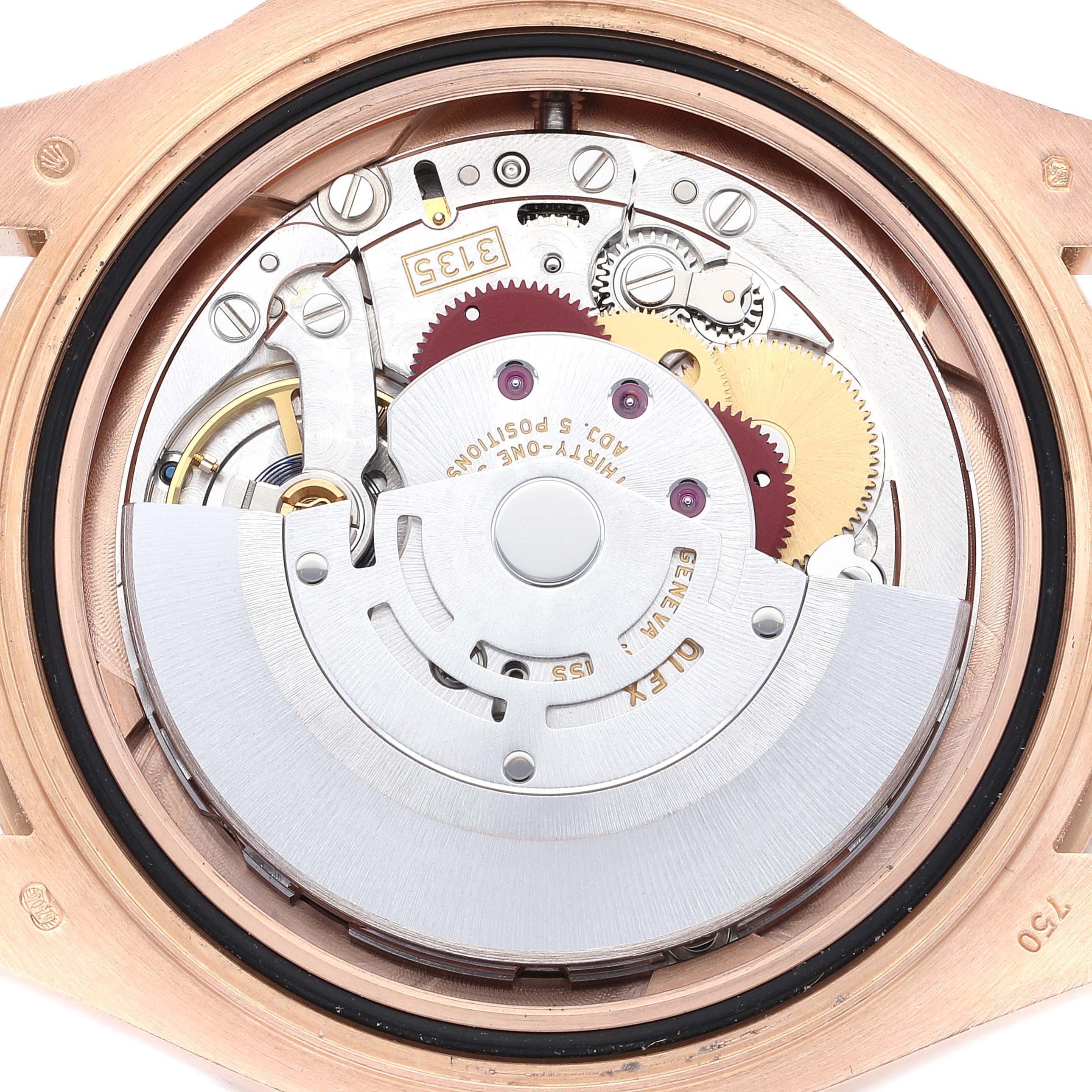 This image shows the internal mechanical movement of a Rolex Yacht-Master 116655 Men
s Rose Gold Black Dial 116655 Men
s Rose Gold Black Dial watch seen from the rear.