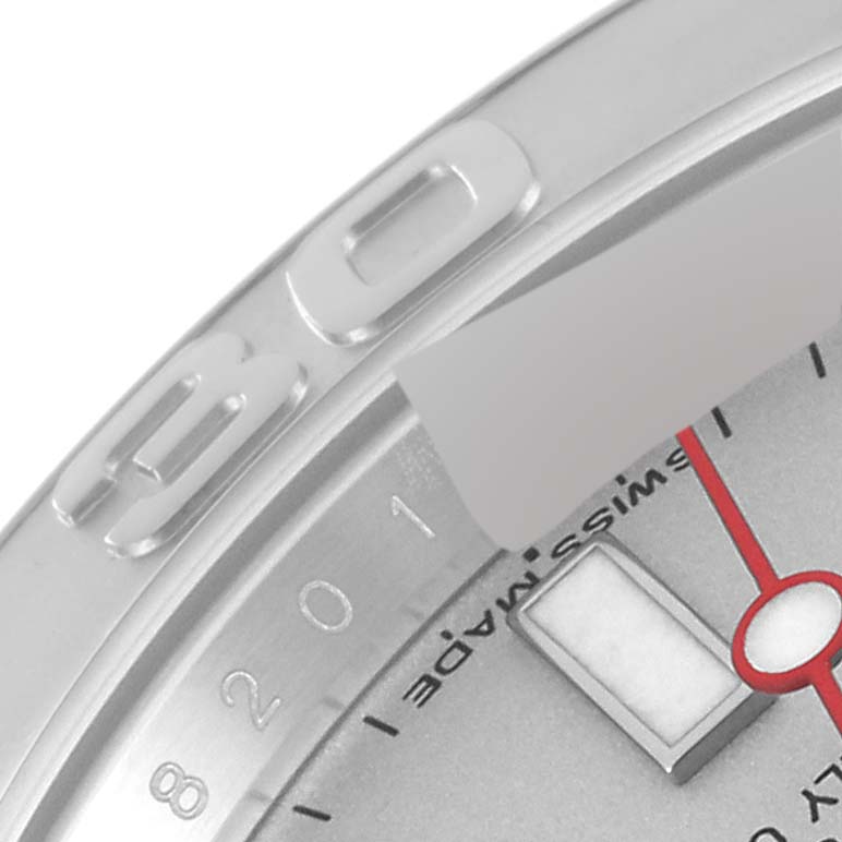 The image shows a close-up of the bezel and part of the dial of a Rolex Yacht-Master 116622 Men
s Stainless Steel Silver Dial 116622 Men
s Stainless Steel Silver Dial watch, highlighting the "30" marker and the bottom of the minute hand.