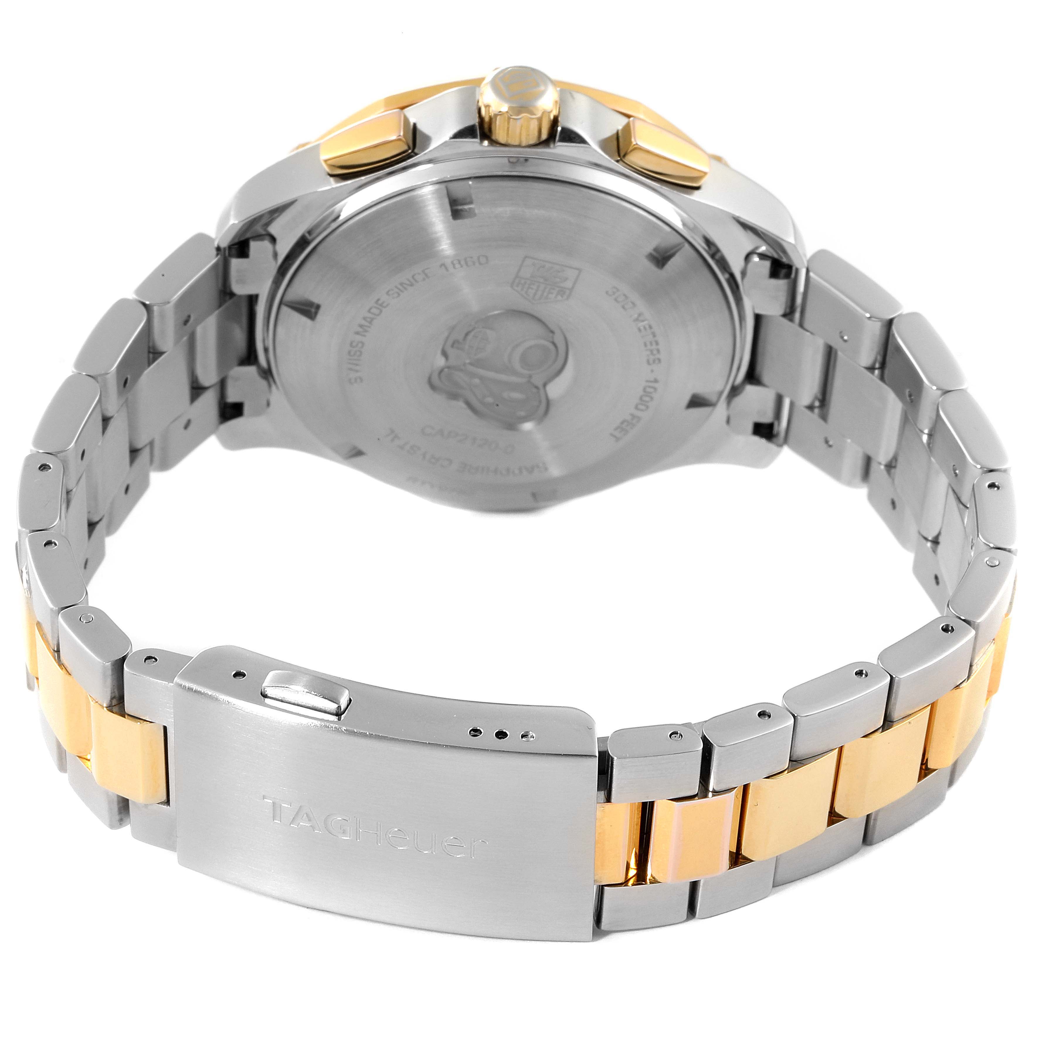 The image shows the back view of the Tag Heuer Aquaracer CAP2120.BB0834 Men's Steel and Gold (two tone) Silver Dial CAP2120.BB0834 Men's Steel and Gold (two tone) Silver Dial watch, highlighting the case back and metal bracelet.
