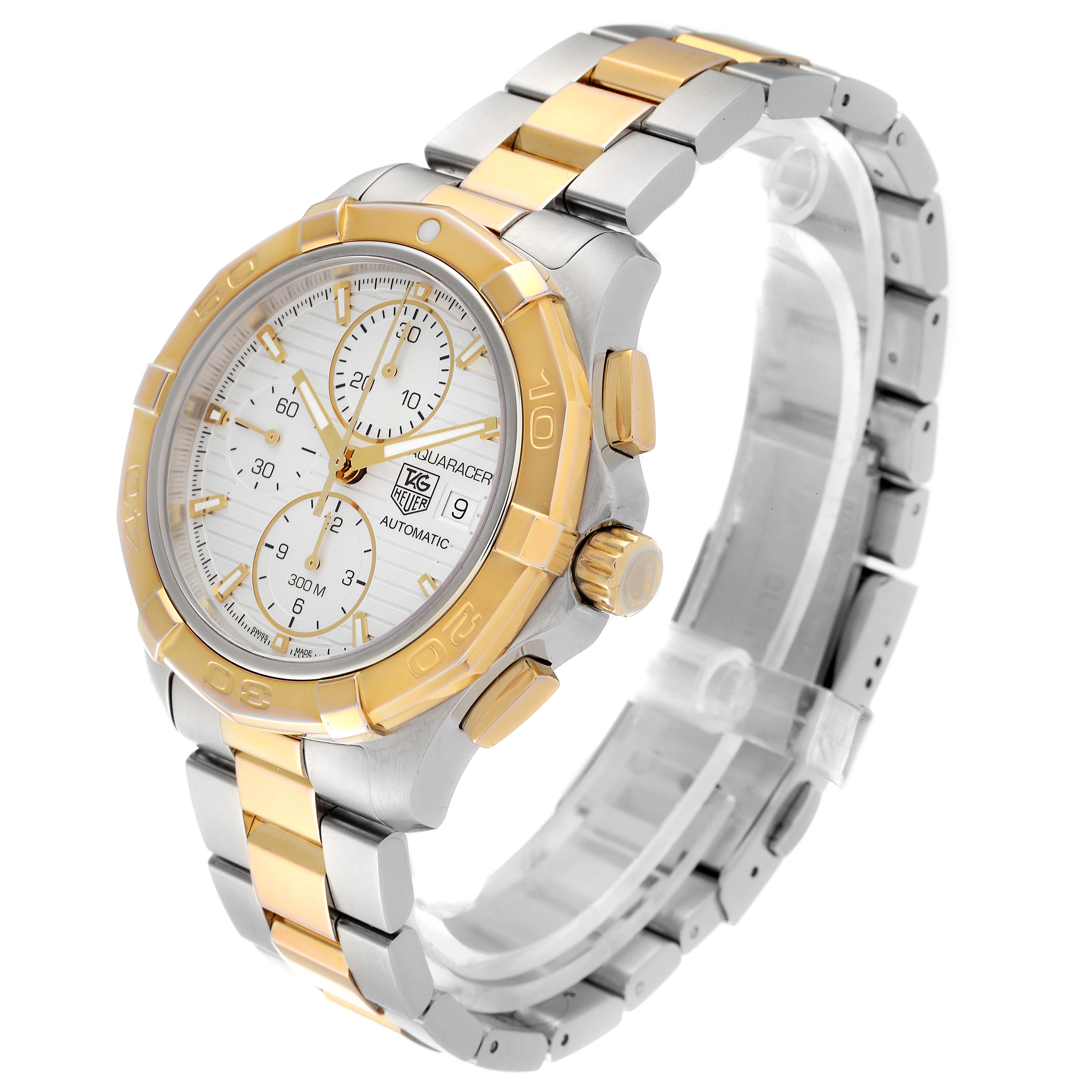 The Tag Heuer Aquaracer CAP2120.BB0834 Men's Steel and Gold (two tone) Silver Dial CAP2120.BB0834 Men's Steel and Gold (two tone) Silver Dial watch is shown at an angled view, highlighting its gold and silver bracelet, bezel, and detailed dial.