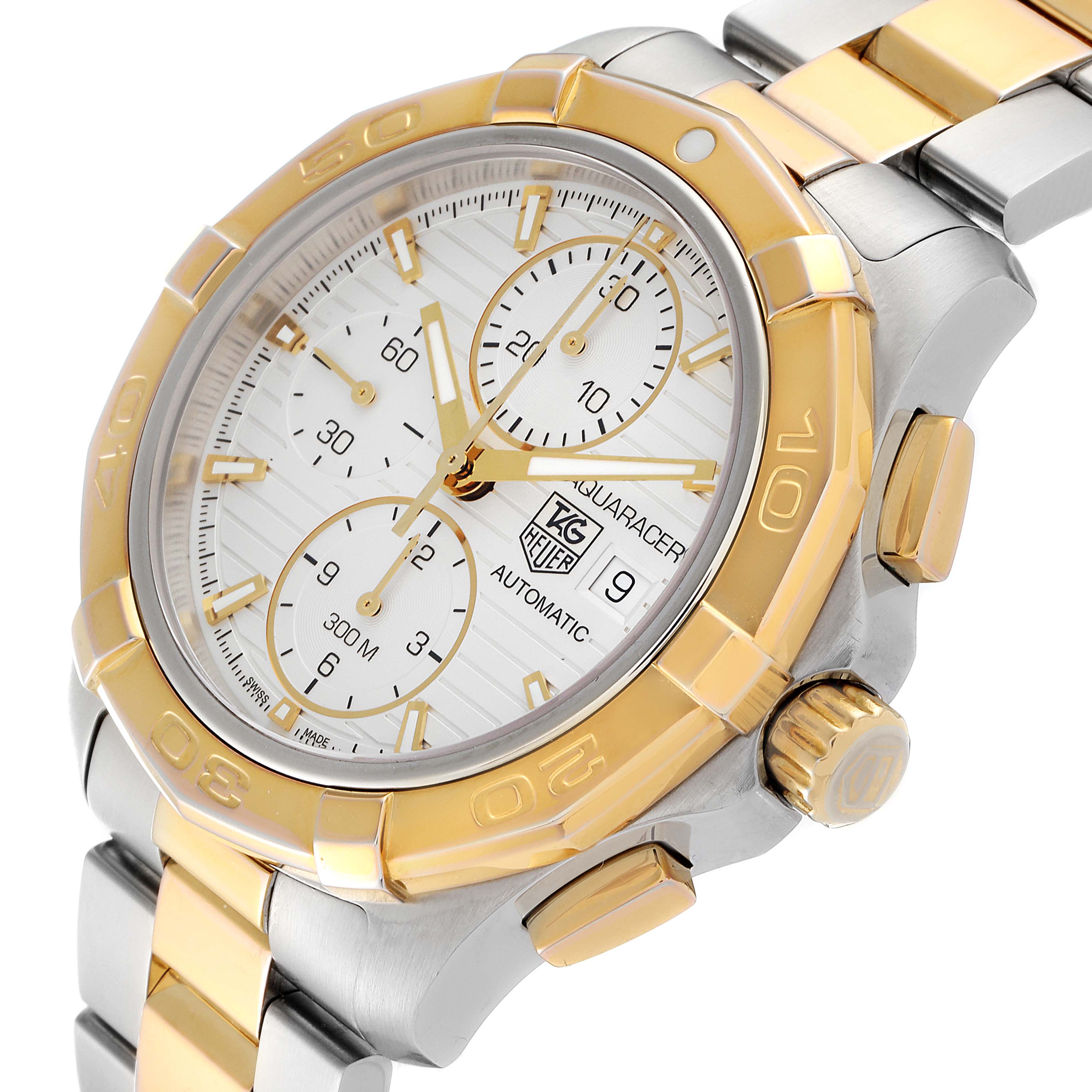 The image shows a close-up angle of a Tag Heuer Aquaracer CAP2120.BB0834 Men's Steel and Gold (two tone) Silver Dial CAP2120.BB0834 Men's Steel and Gold (two tone) Silver Dial watch, highlighting the dial, bezel, crown, and part of the metal bracelet.