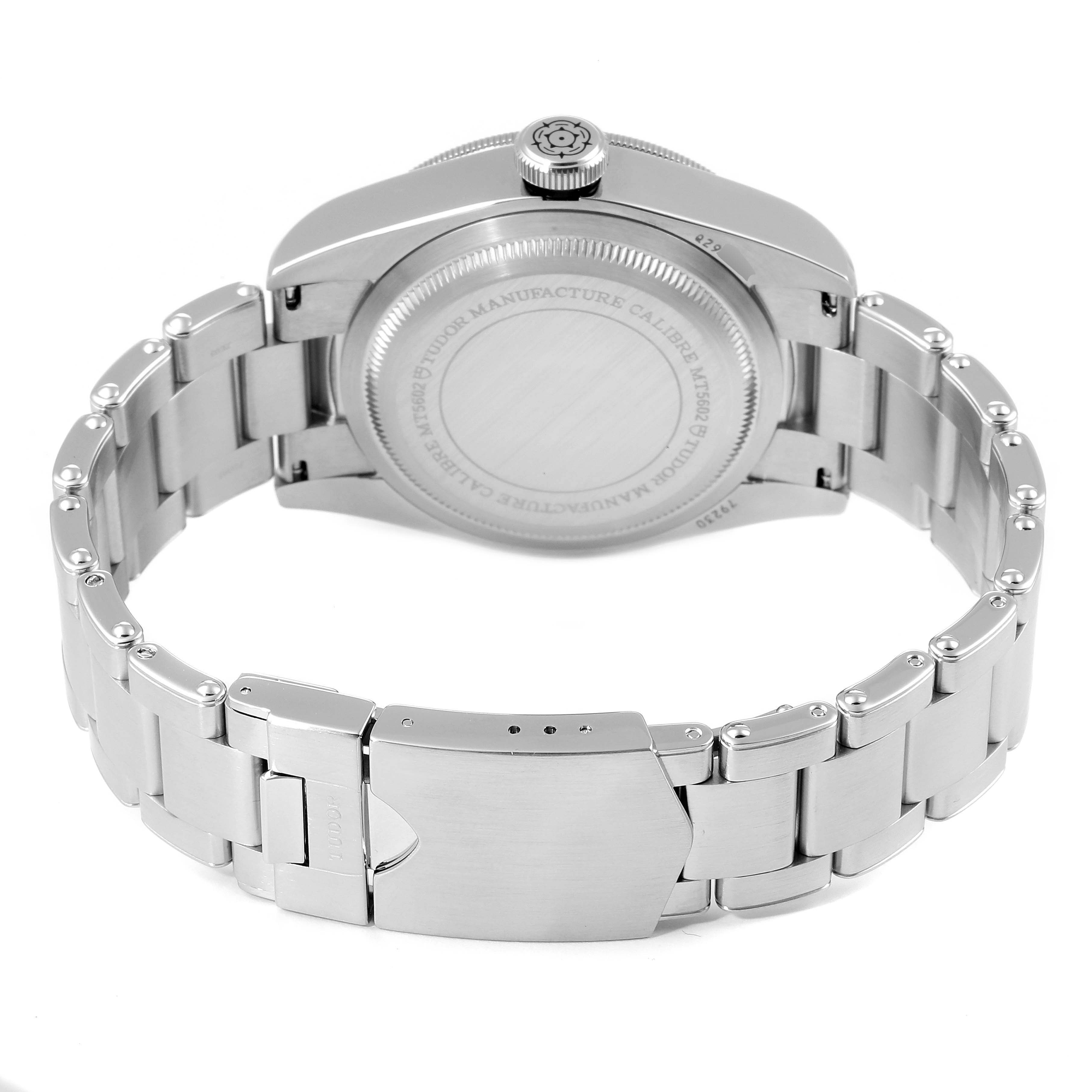 The image shows the back case and metal bracelet of the Tudor Heritage Black Bay 79230 Men
s Stainless Steel Black Dial 79230 Men
s Stainless Steel Black Dial watch from a rear angle.