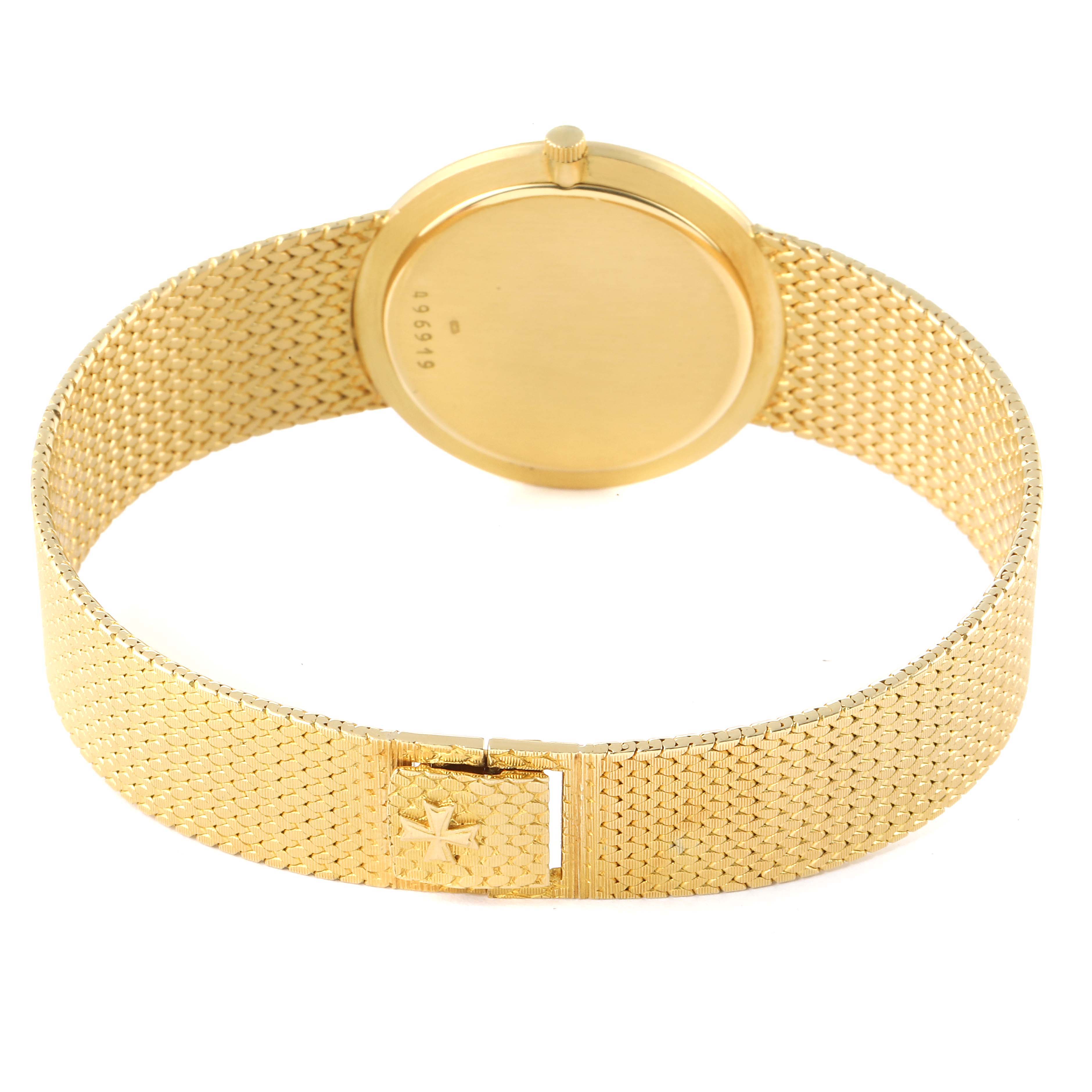 The image shows the back view of a Vacheron Constantin Patrimony 6872 Men's Yellow Gold Champagne Dial 6872 Men's Yellow Gold Champagne Dial watch, highlighting the case back, crown, and woven gold bracelet with clasp.