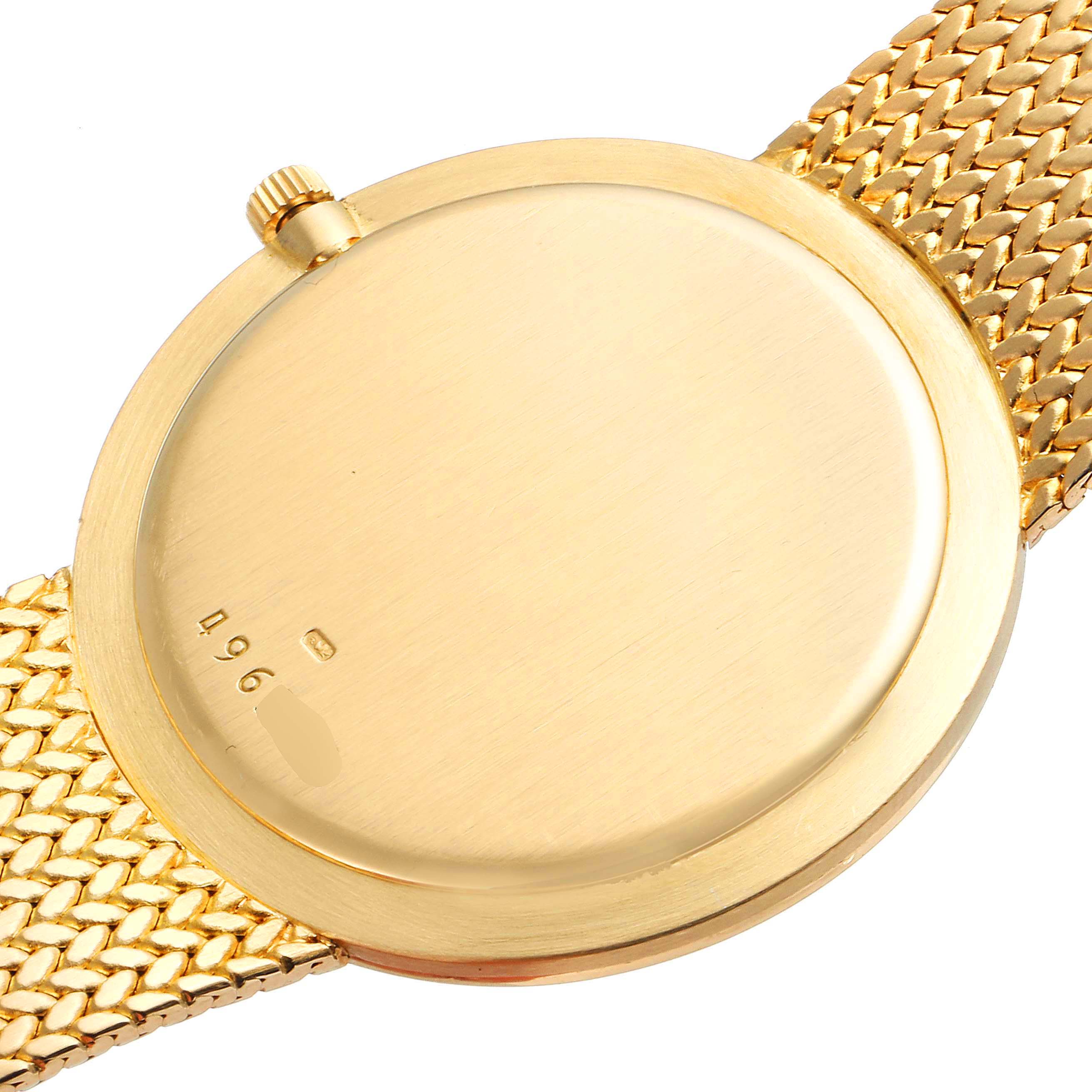 This is a rear view of the Vacheron Constantin Patrimony 6872 Men's Yellow Gold Champagne Dial 6872 Men's Yellow Gold Champagne Dial watch showing the case back and the crown.