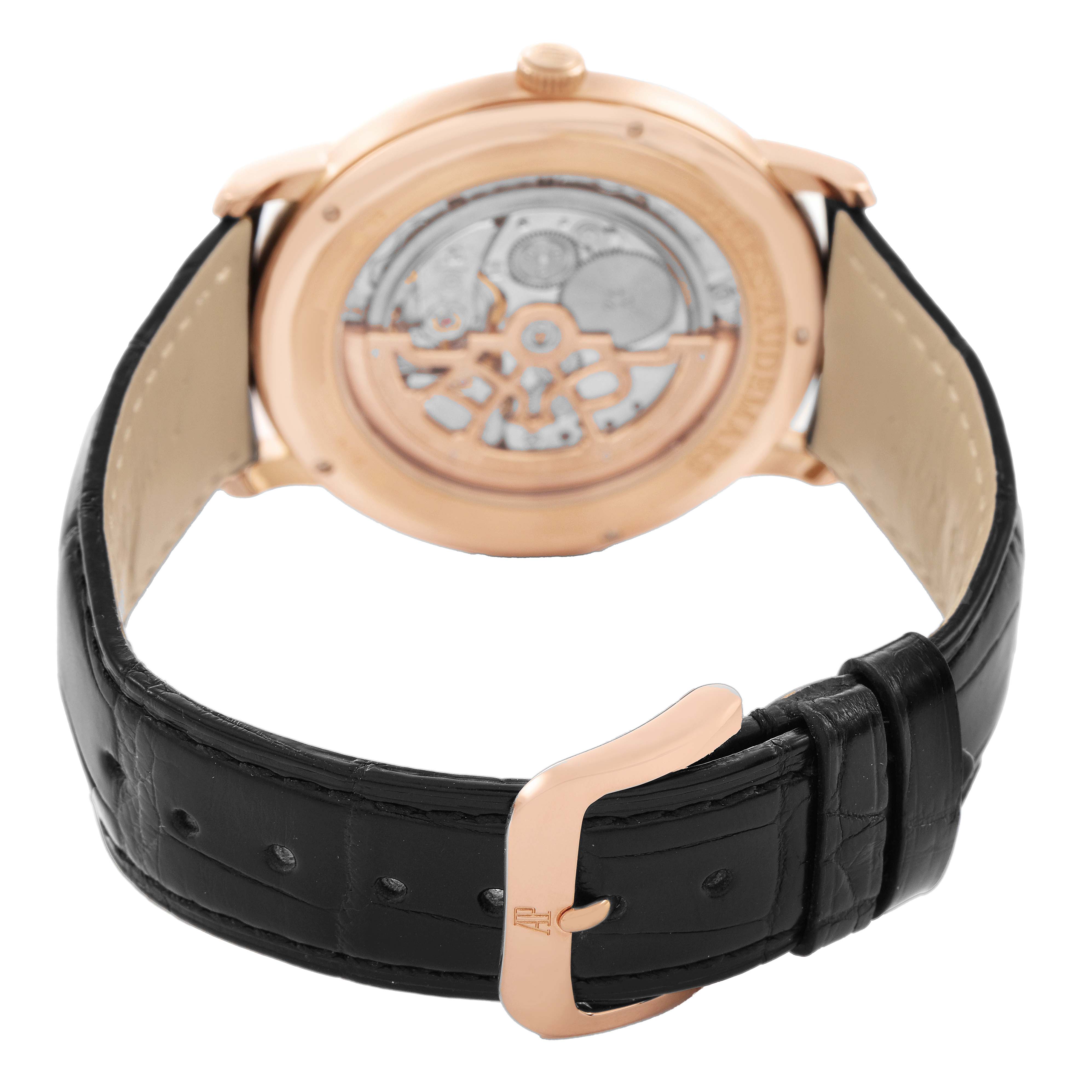The image shows the back view of the Audemars Piguet Jules 15180OR Men's Rose Gold Black Dial watch, highlighting its transparent case back and leather strap.