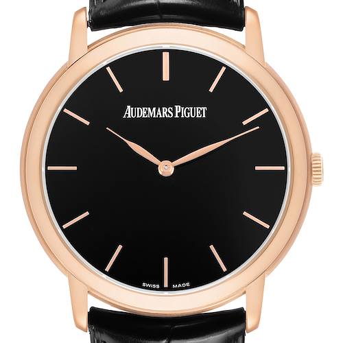 The Jules model by Audemars Piguet is shown from the front, displaying its black dial, rose gold case, and simple hour markers.