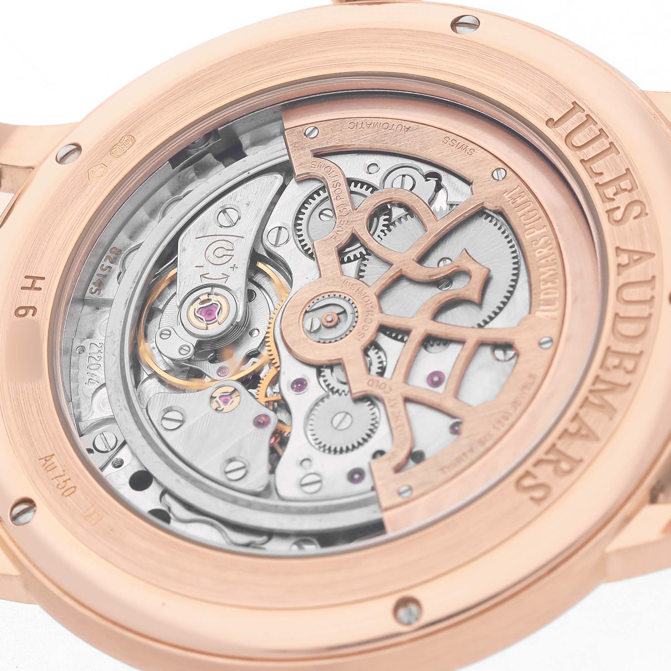 The image shows the back view of an Audemars Piguet Jules 15180OR Men's Rose Gold Black Dial watch, highlighting its intricate movement and case details.
