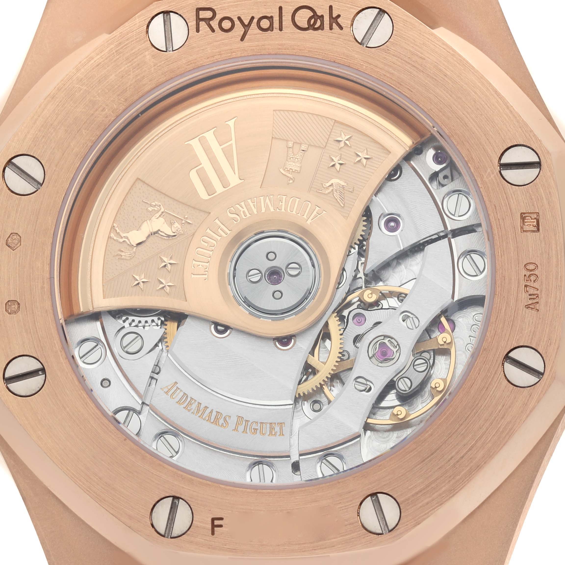 The image shows the back view of the Audemars Piguet Royal Oak model 15451OR, highlighting its intricate movement and rotor.