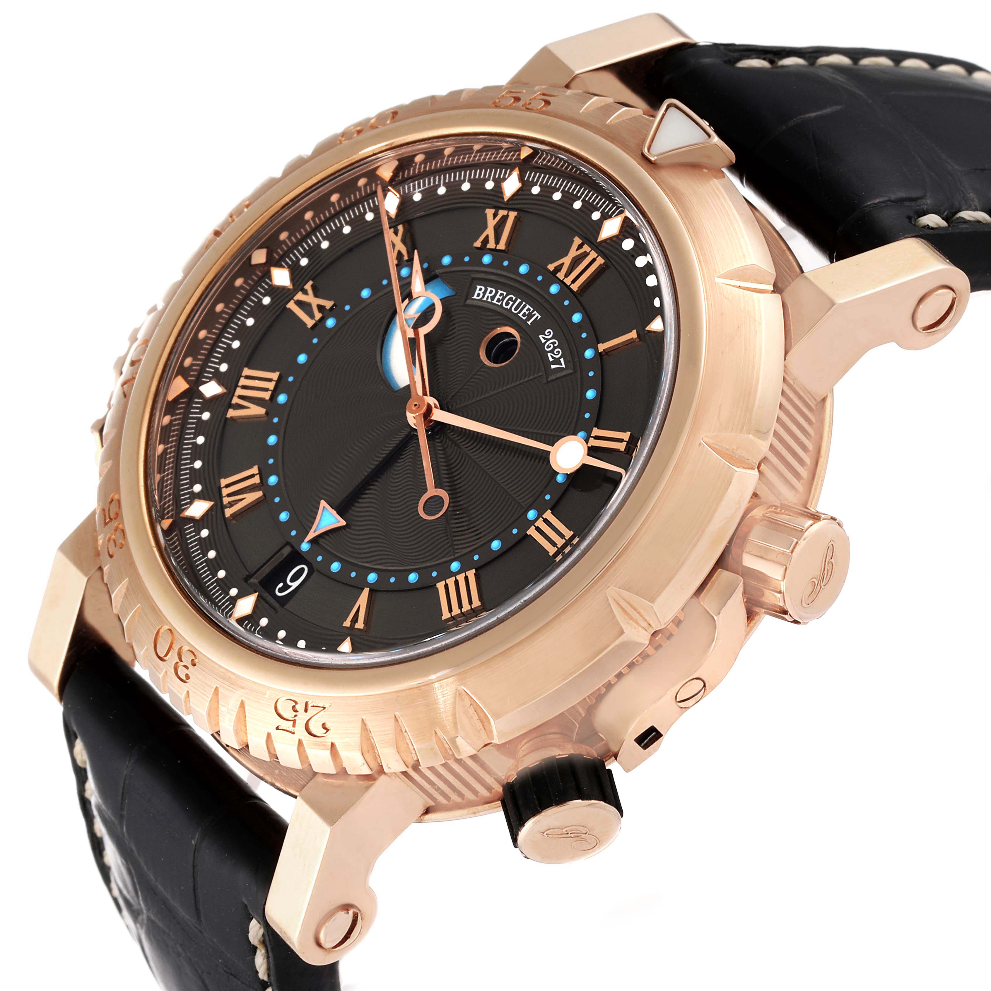 The Breguet Marine 5847BR/Z2/5ZV Men's Rose Gold Black Dial 5847BR/Z2/5ZV Men's Rose Gold Black Dial watch is shown at an angle highlighting the side, crown, bezel, and part of the leather strap.