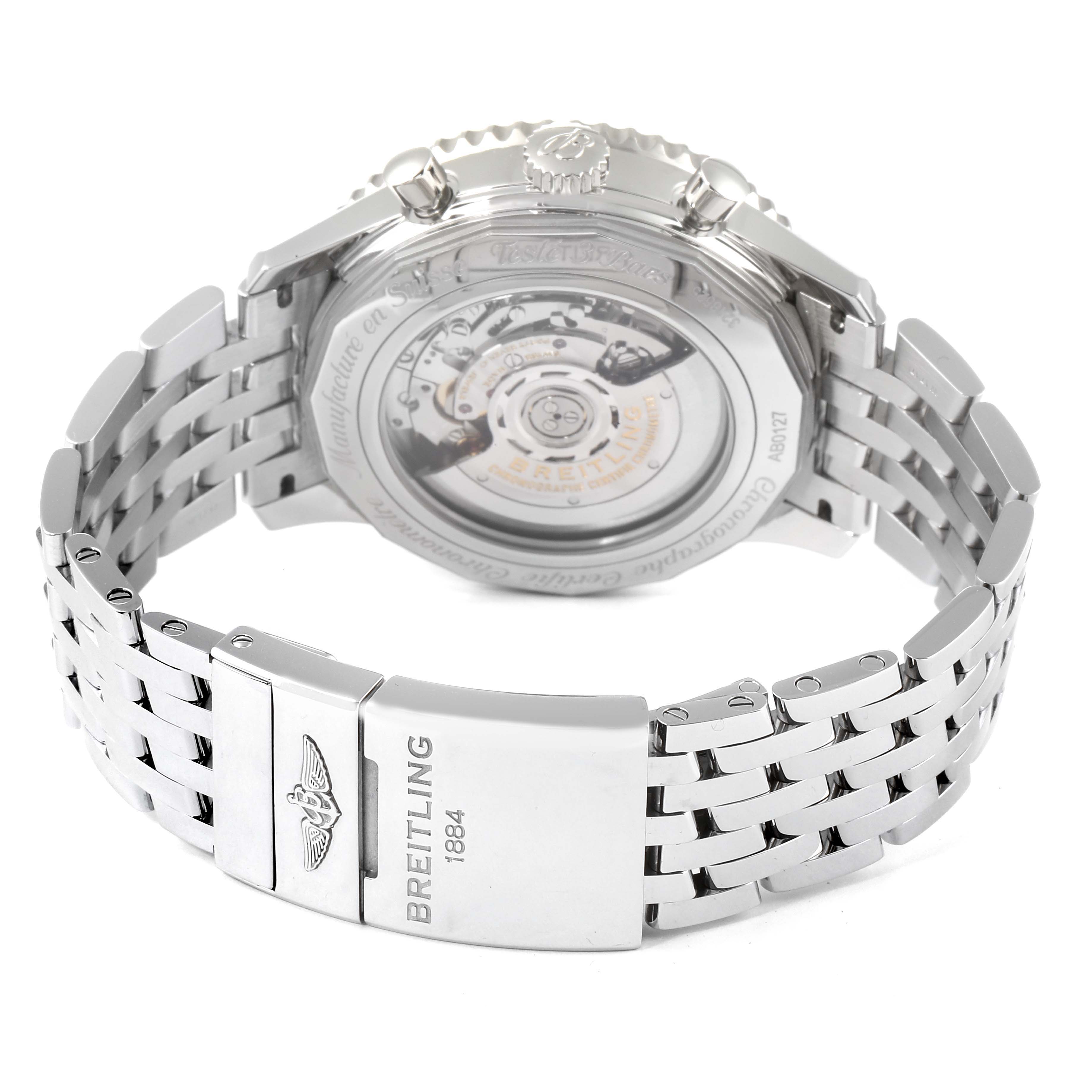 The image shows the back view of the Breitling Navitimer AB0127-211-B1A1 Men's Stainless Steel Black Dial AB0127-211-B1A1 Men's Stainless Steel Black Dial watch, highlighting its transparent case back and metal bracelet.