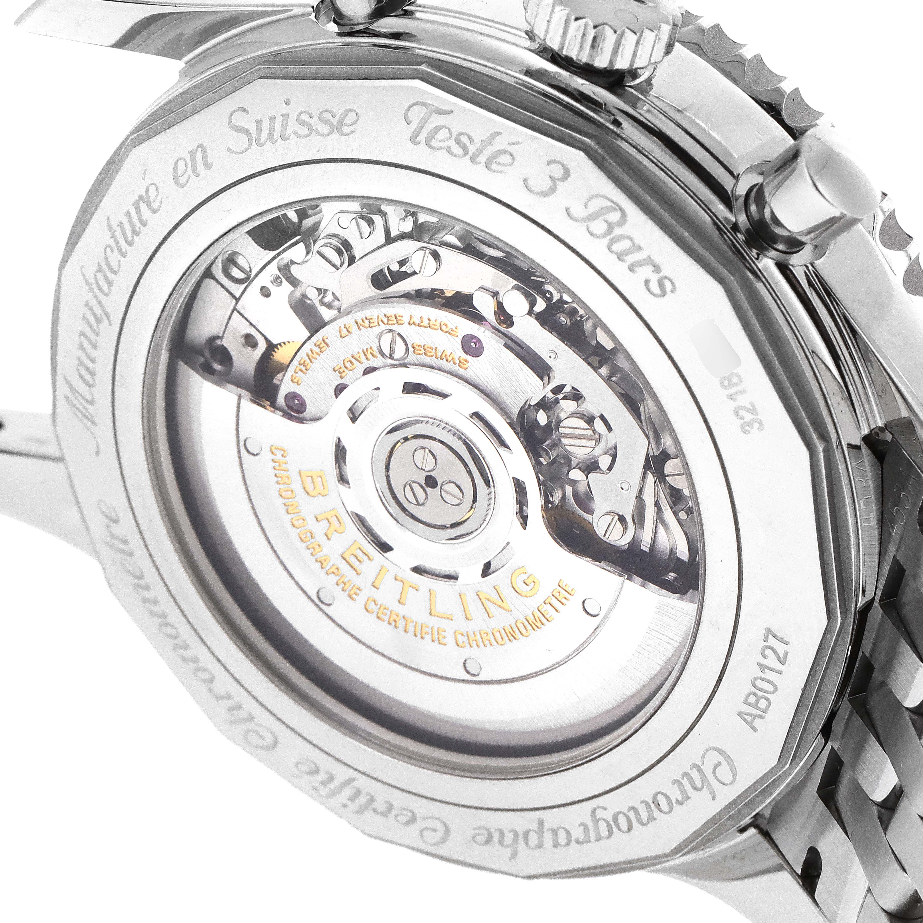 The image shows the back of a Breitling Navitimer AB0127-211-B1A1 Men's Stainless Steel Black Dial AB0127-211-B1A1 Men's Stainless Steel Black Dial watch, highlighting the movement and inscriptions.