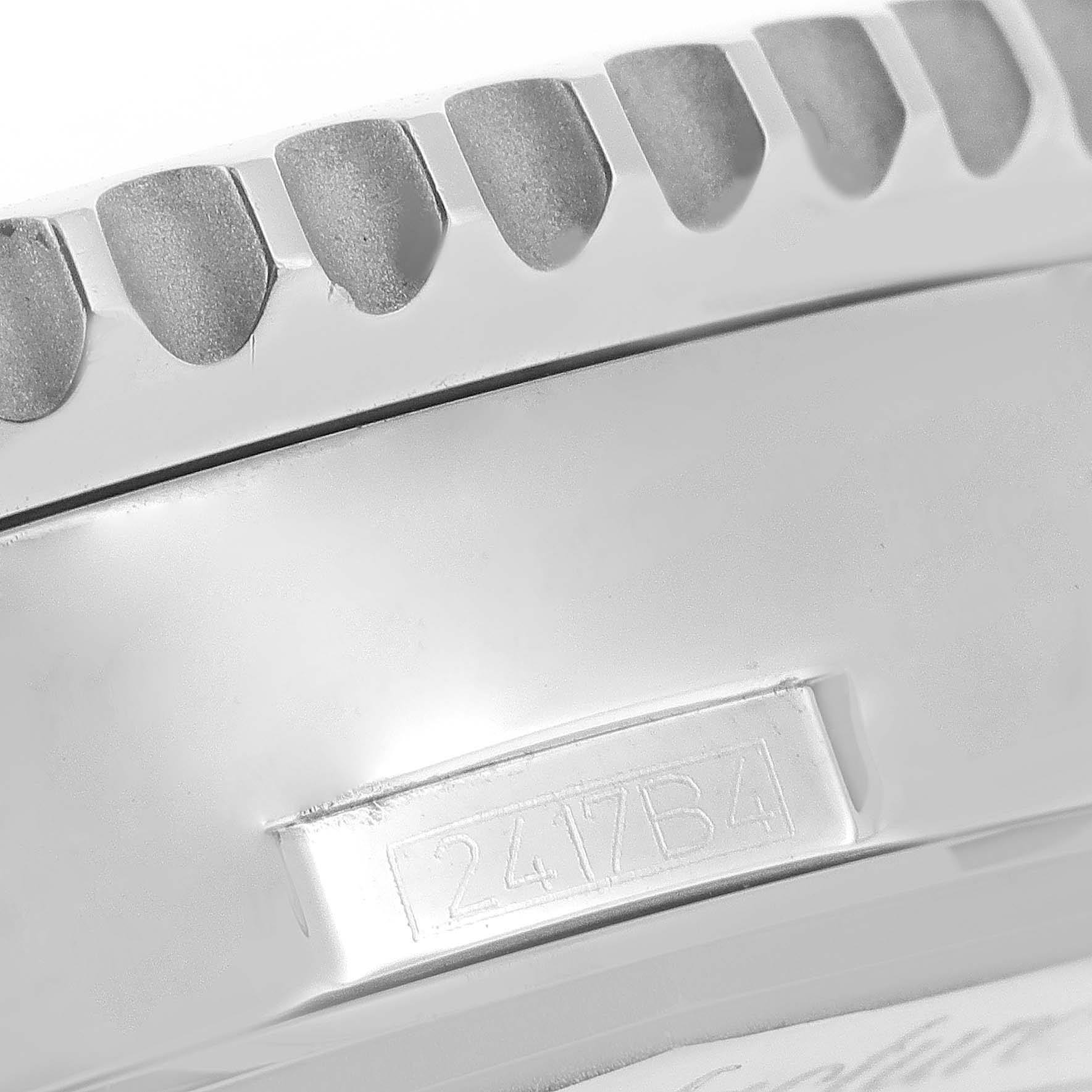The image shows a close-up of the edge, serial number, and bezel of the Breitling Navitimer AB0127-211-B1A1 Men's Stainless Steel Black Dial AB0127-211-B1A1 Men's Stainless Steel Black Dial watch.