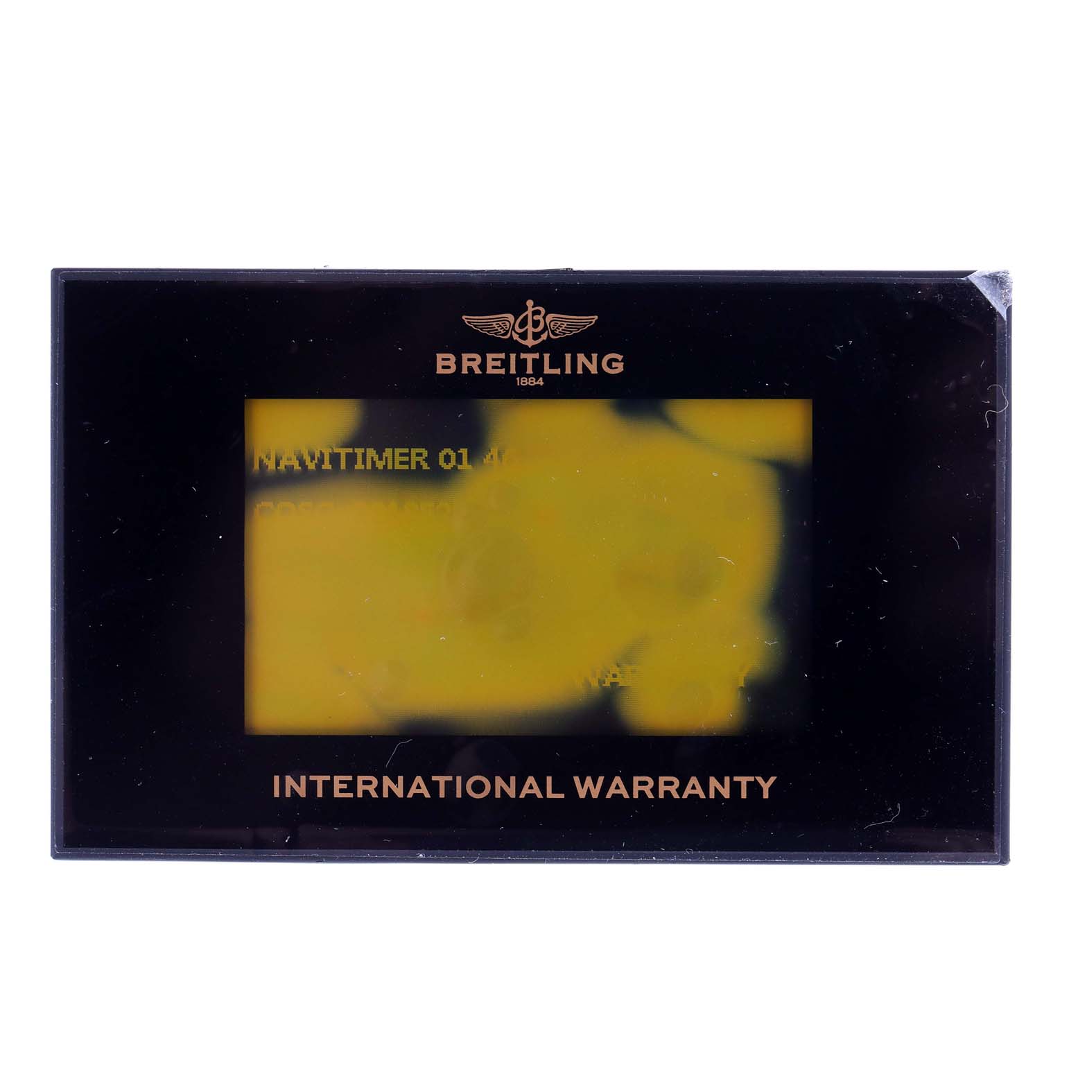 A flat view of a Breitling Navitimer AB0127-211-B1A1 Men's Stainless Steel Black Dial AB0127-211-B1A1 Men's Stainless Steel Black Dial International Warranty card is shown.