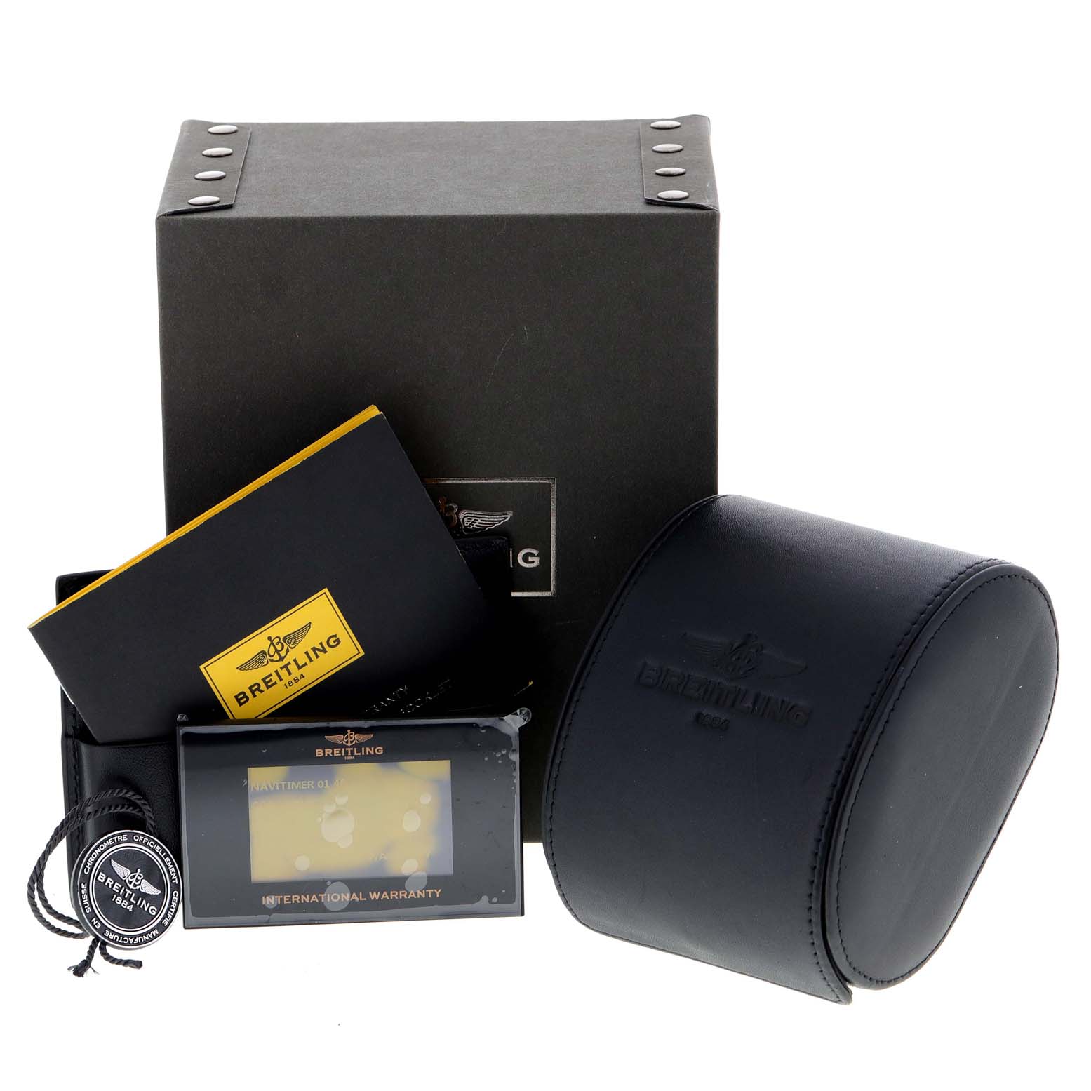 The image shows a Breitling Navitimer AB0127-211-B1A1 Men's Stainless Steel Black Dial AB0127-211-B1A1 Men's Stainless Steel Black Dial watch box, a leather case, a manual, and an international warranty card.