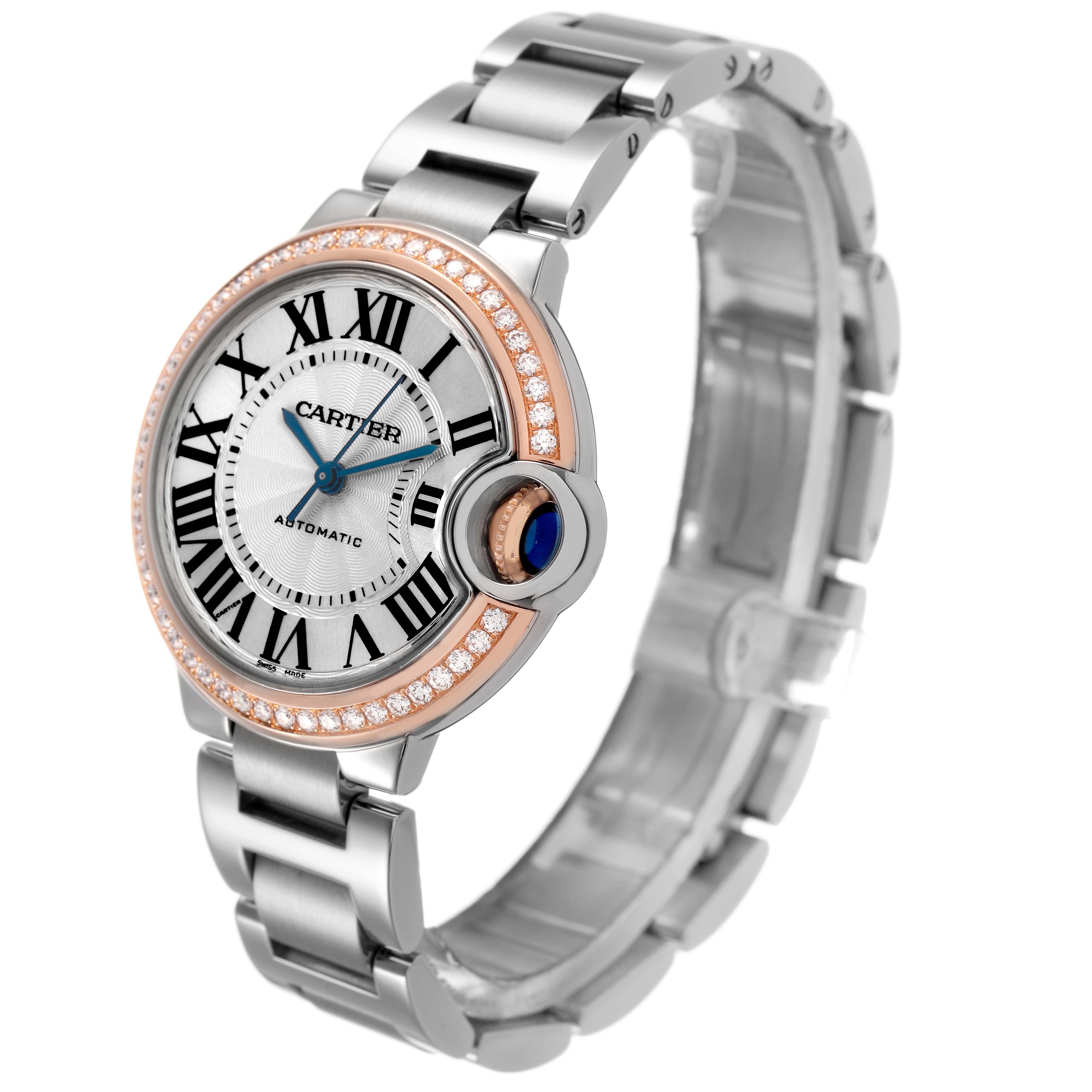 The Cartier Ballon Bleu WE902080 Women's Stainless Steel Silver Dial watch is shown at a three-quarter angle, highlighting its round face, Roman numerals, bracelet, and crown.