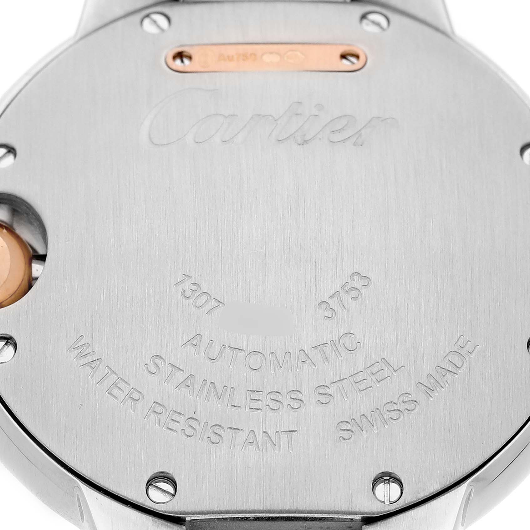 This image shows the back case of a Cartier Ballon Bleu WE902080 Women's Stainless Steel Silver Dial watch, highlighting engravings and materials.