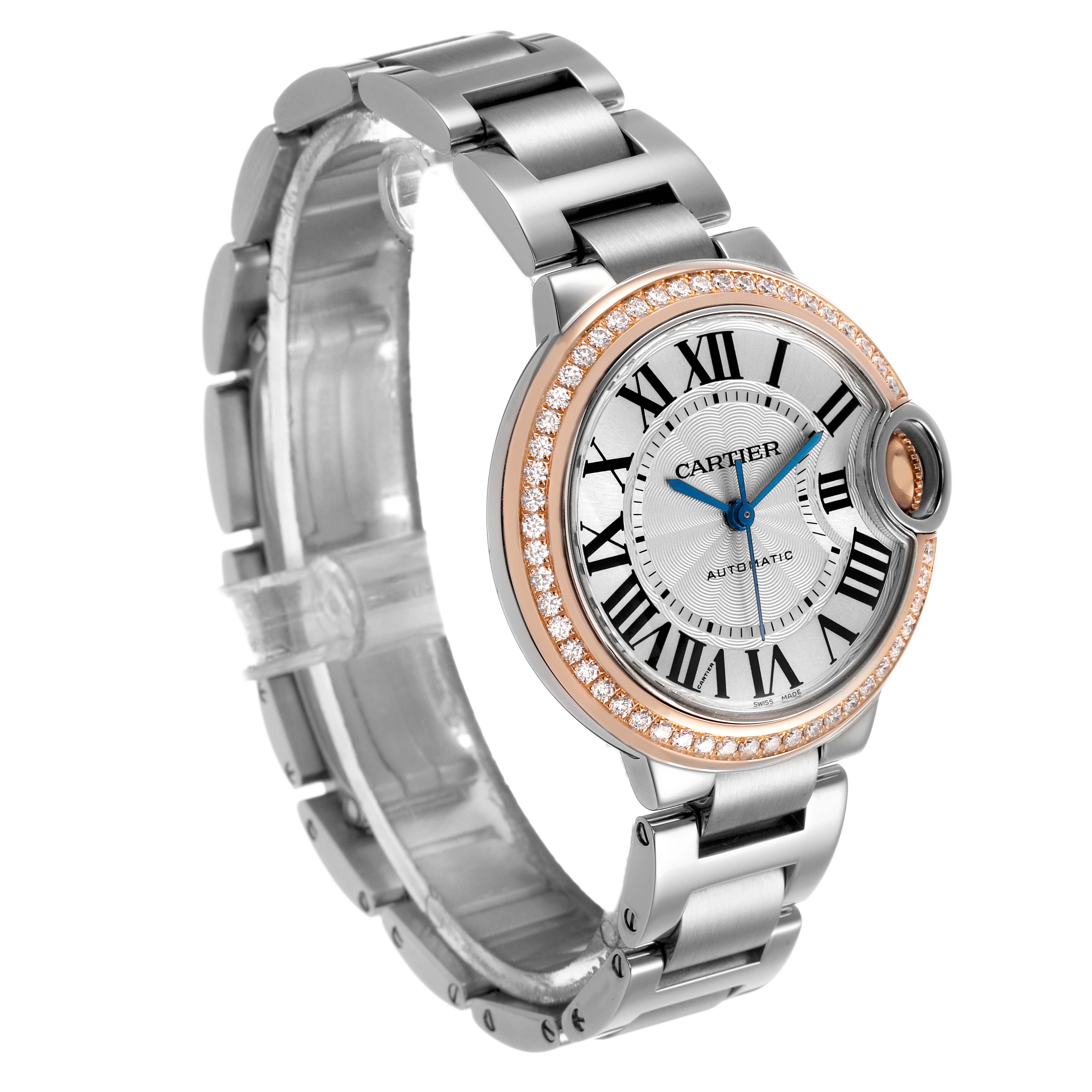 The Cartier Ballon Bleu WE902080 Women's Stainless Steel Silver Dial watch is shown at a three-quarter angle, highlighting its silver bracelet, diamond bezel, and Roman numeral dial.