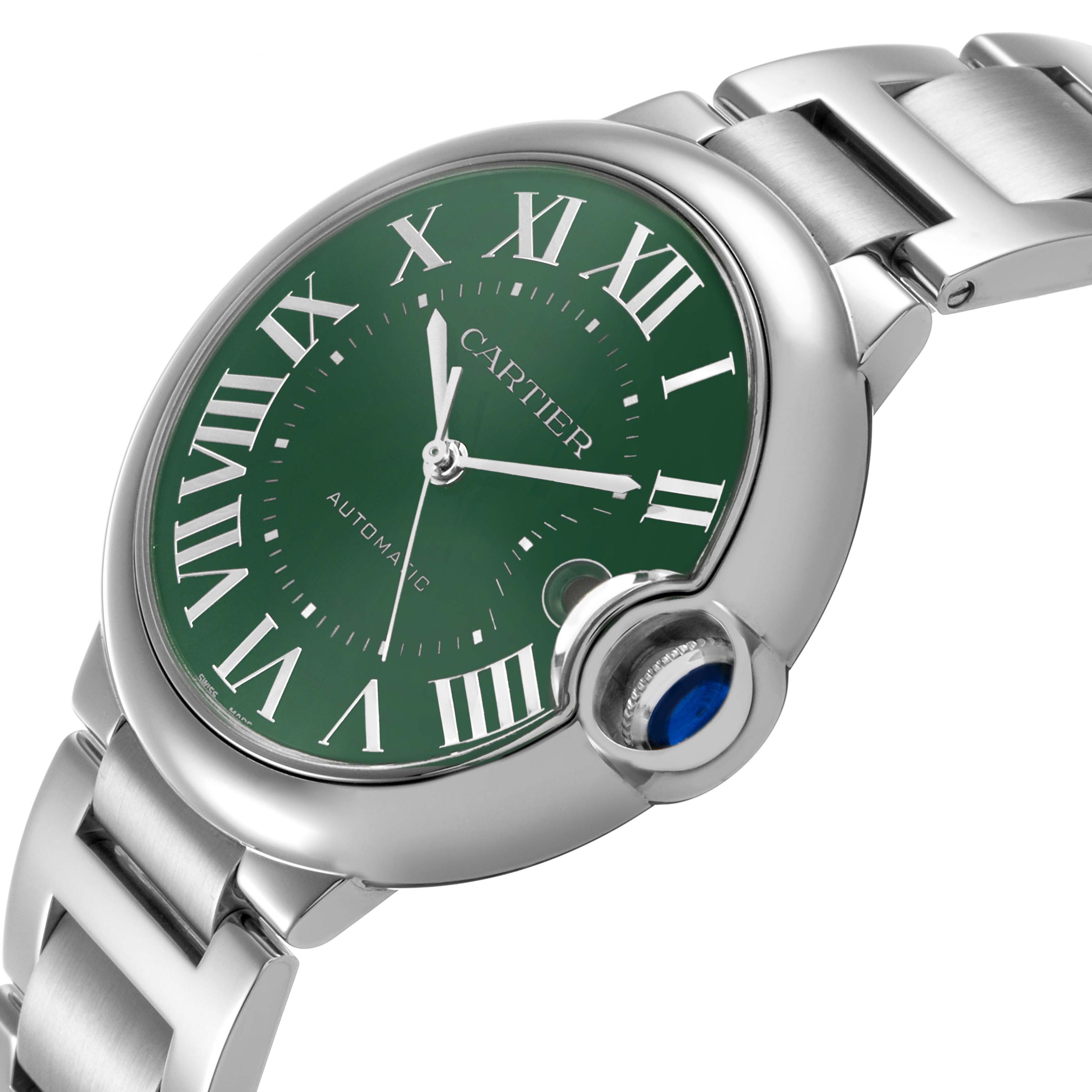 The Cartier Ballon Bleu WSBB0071 Men's Stainless Steel Green Dial watch is shown at an angle emphasizing the green dial, Roman numerals, and side view of the round case with a crown.