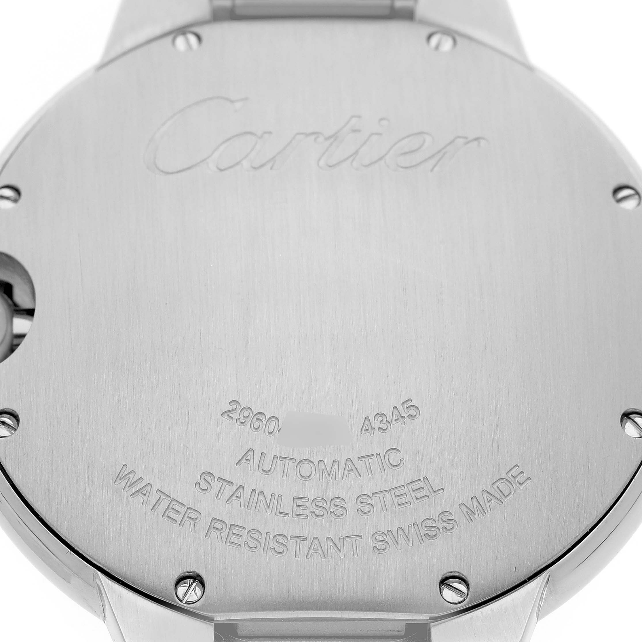The image shows the back of a Cartier Ballon Bleu WSBB0071 Men's Stainless Steel Green Dial watch, highlighting engravings and metal screws.
