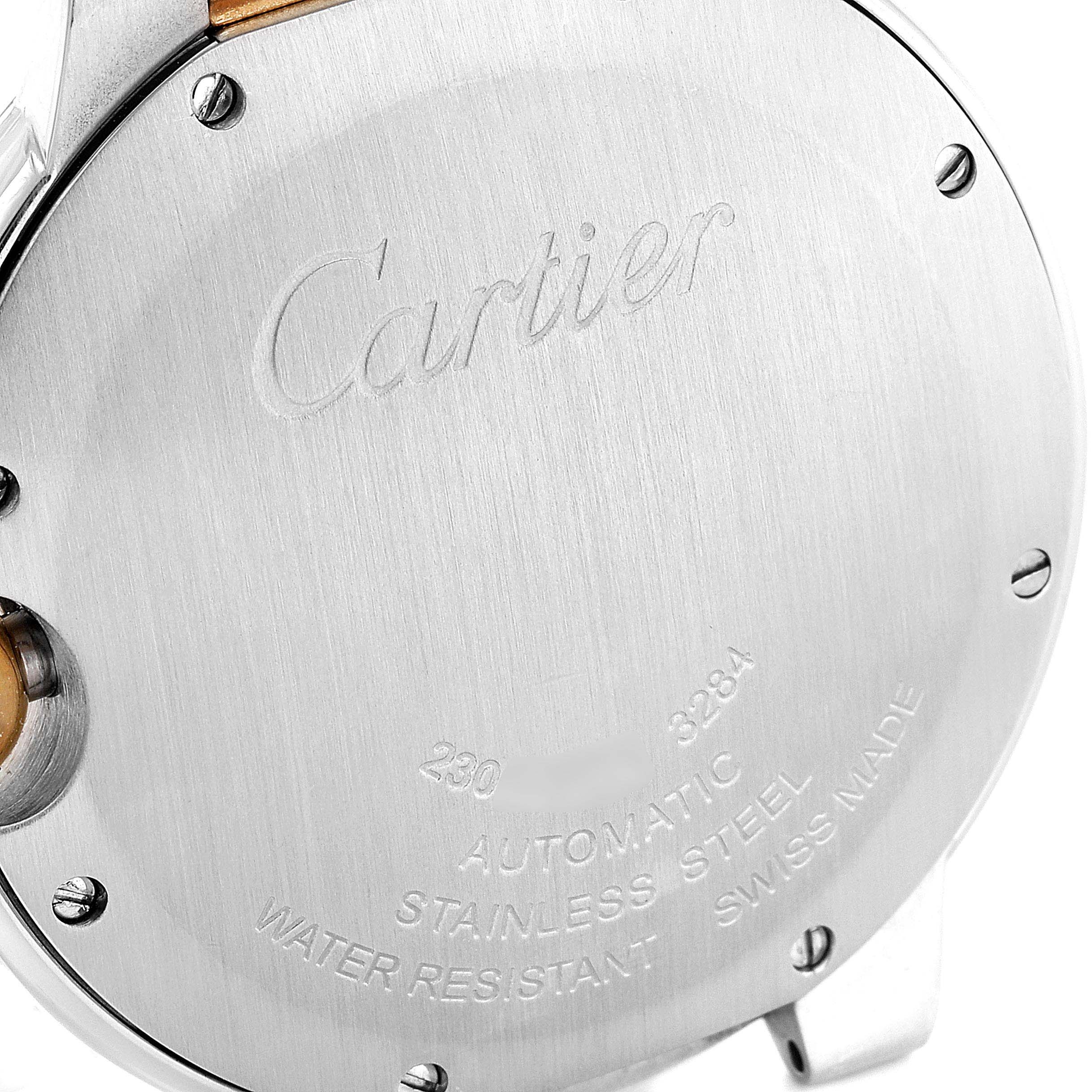This image shows the back case of the Cartier Ballon Bleu W2BB0012 Women
s Steel and Gold (two tone) Silver Dial W2BB0012 Women
s Steel and Gold (two tone) Silver Dial watch, highlighting engravings and screws.