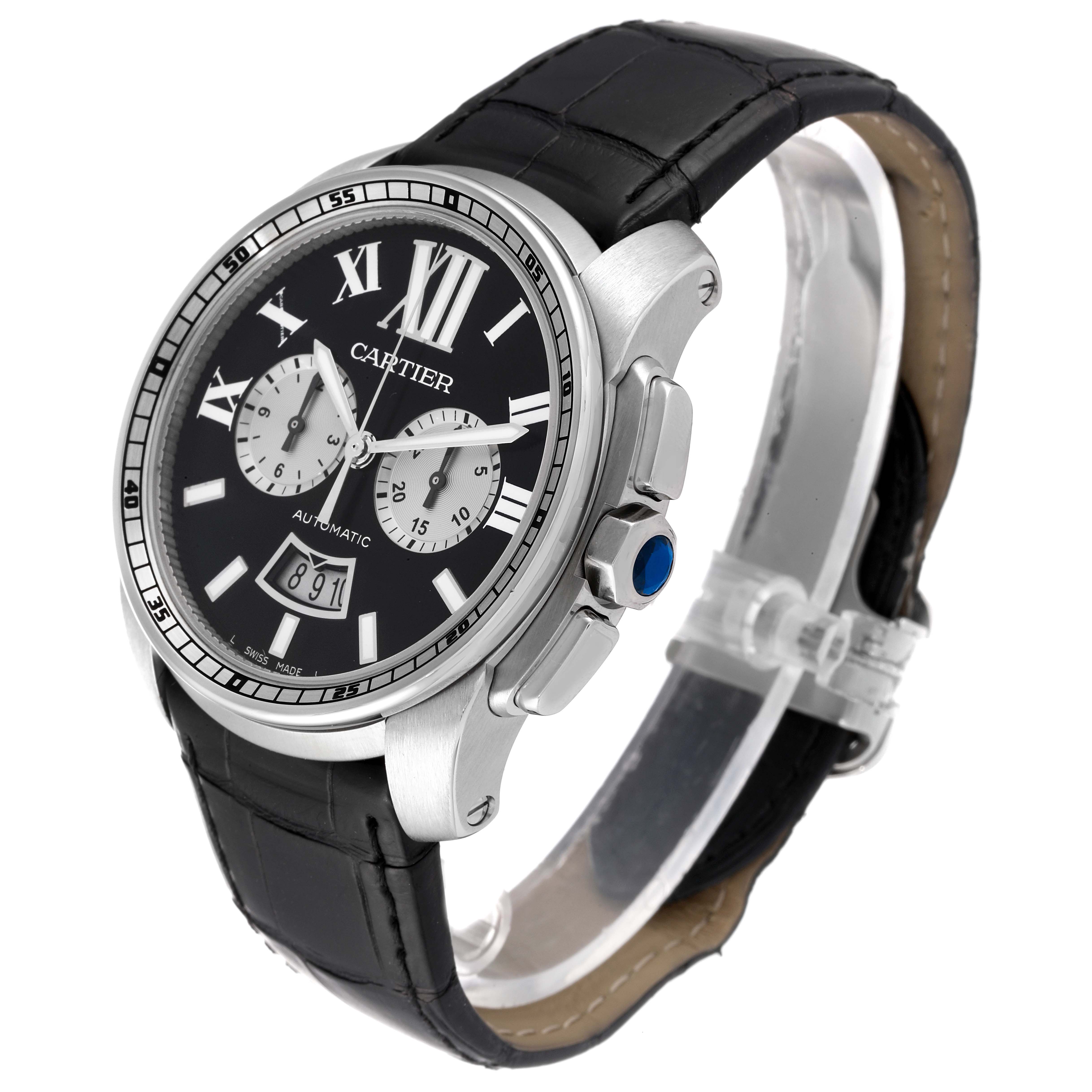 The image shows a Calibre de Cartier watch by Cartier from an oblique angle, highlighting its black dial, leather strap, and side buttons.