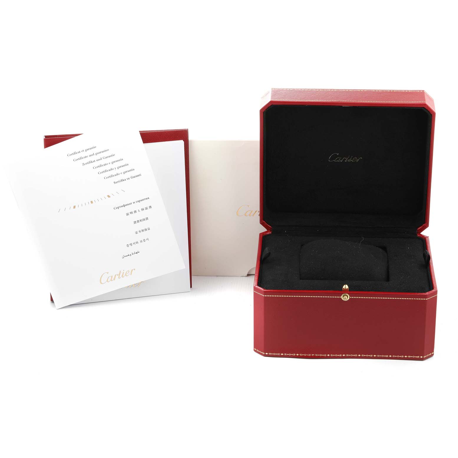 The image shows the packaging, including the open box and documents, for the Calibre de Cartier watch by Cartier.