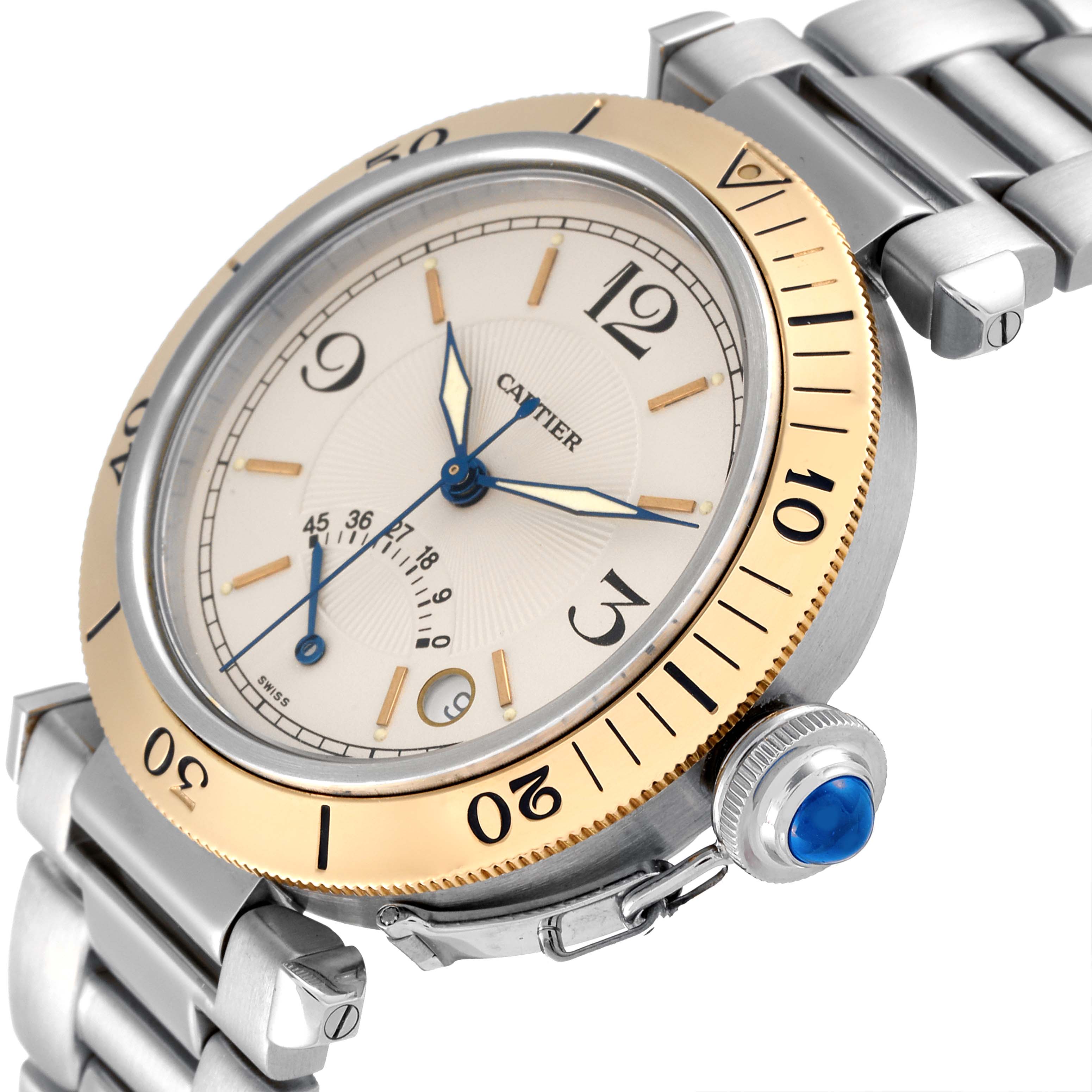 The image shows a close-up, angled view of the Cartier Pasha W3101255 Men
s Steel and Gold (two tone) Silver Dial W3101255 Men
s Steel and Gold (two tone) Silver Dial watch, focusing on its face, bezel, crown, and bracelet.