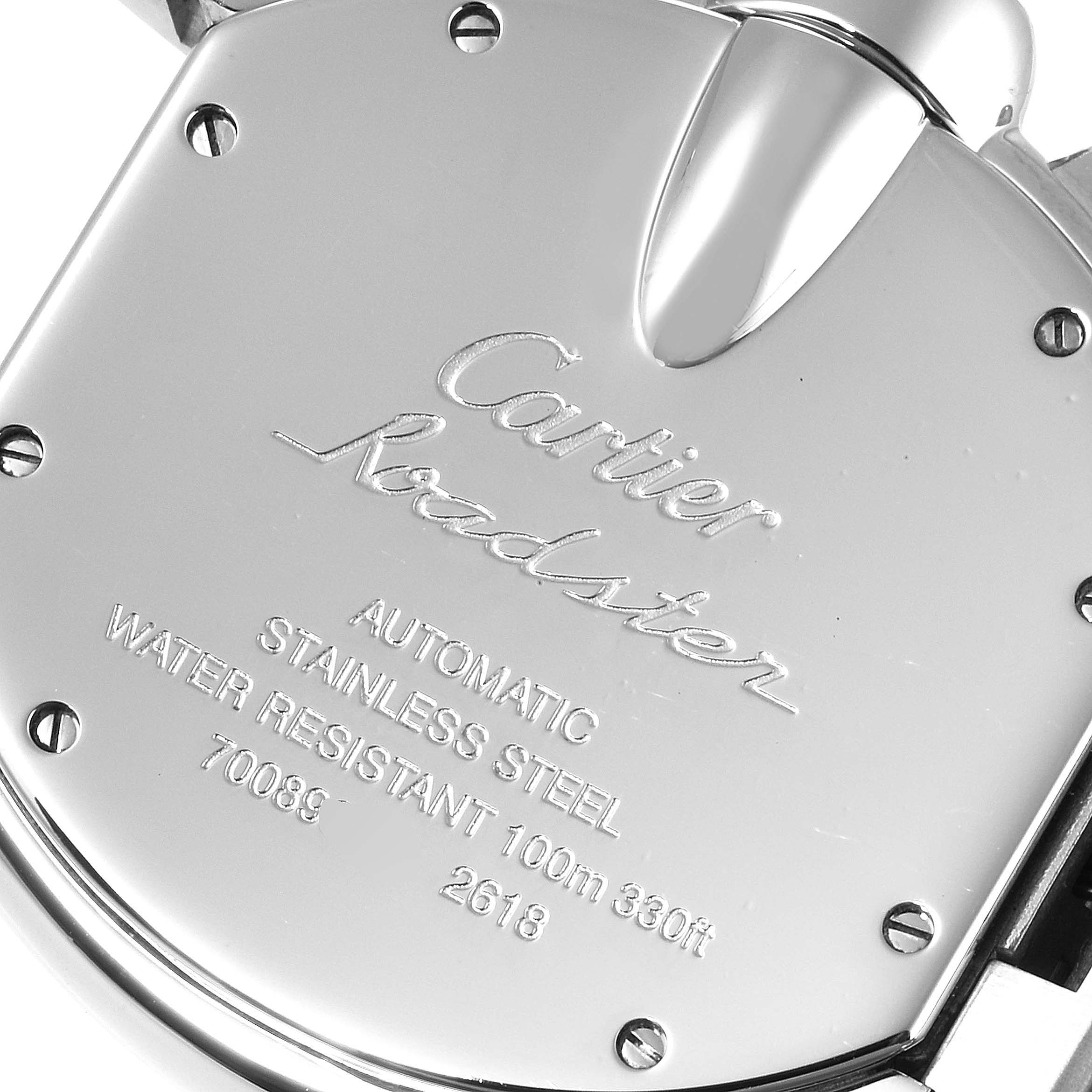 The image shows the back case of a Cartier Roadster W62020X6 Men
s Stainless Steel Black Dial W62020X6 Men
s Stainless Steel Black Dial watch, highlighting the brand and watch specifications.