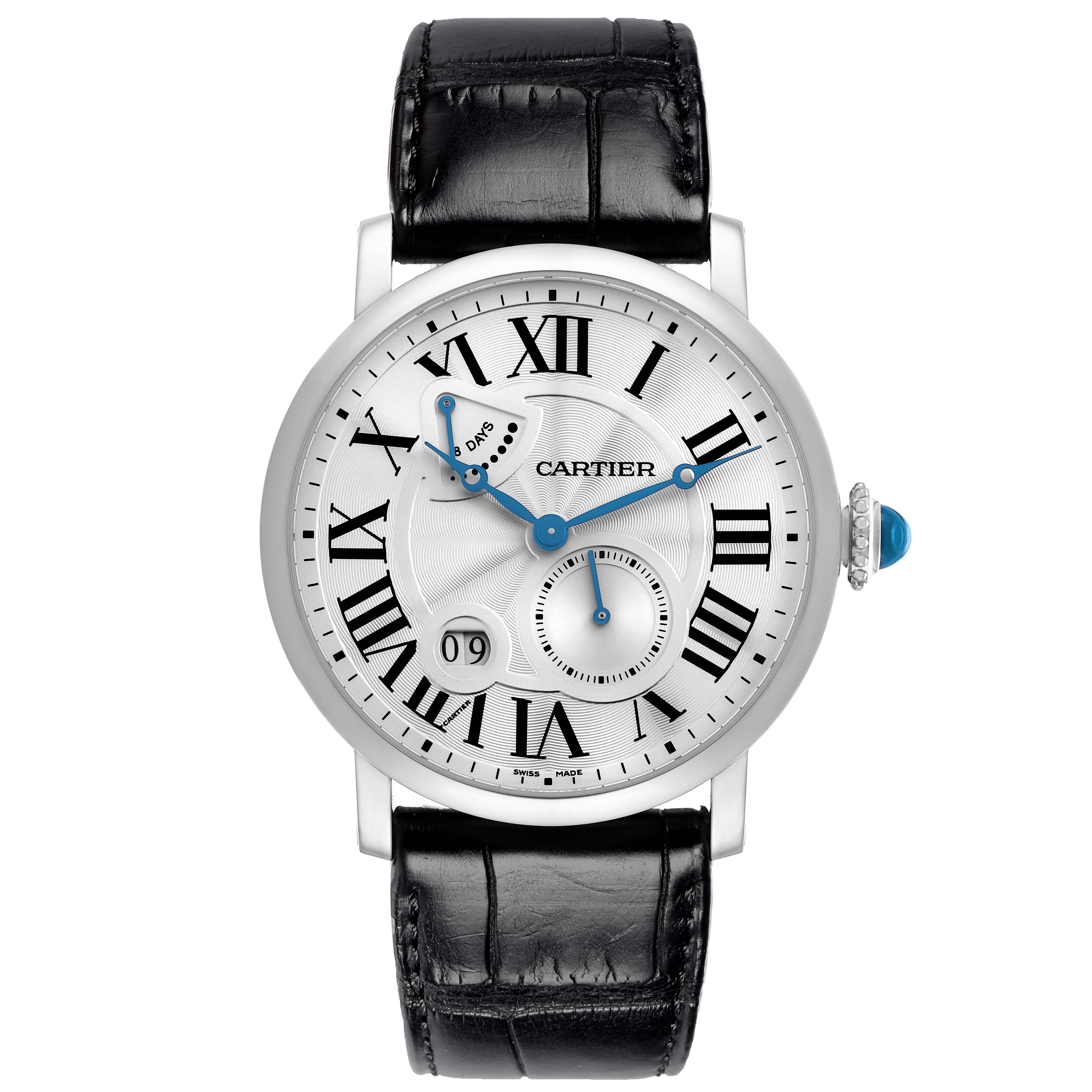 The Cartier Rotonde model W1556202 watch is shown from a front angle, displaying its Roman numeral dial, blue hands, date window, and black leather strap.