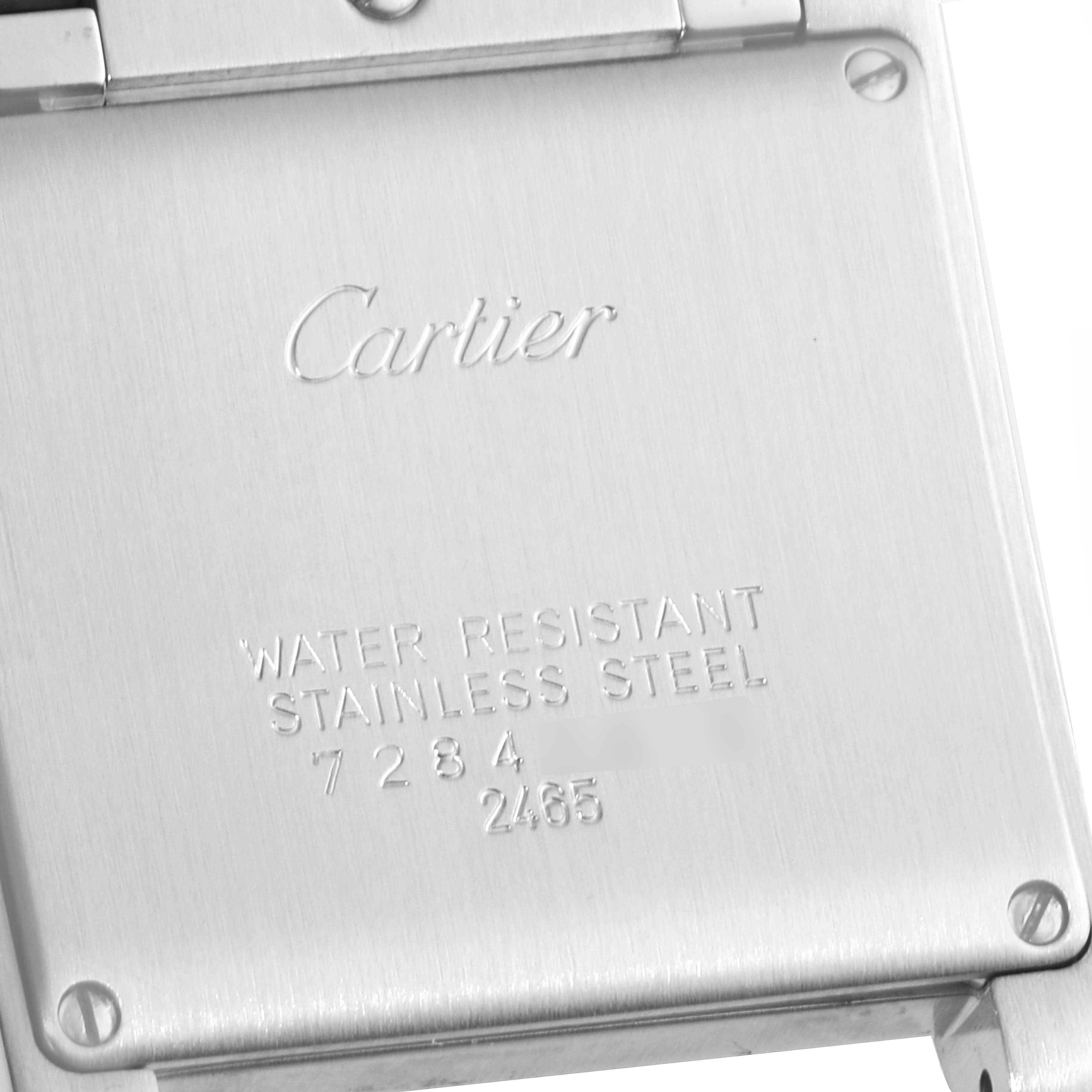 This image shows the back case of a Cartier Tank Francaise W51012Q4 Women's Steel and Gold (two tone) Silver Dial W51012Q4 Women's Steel and Gold (two tone) Silver Dial watch, displaying branding and water resistance information.