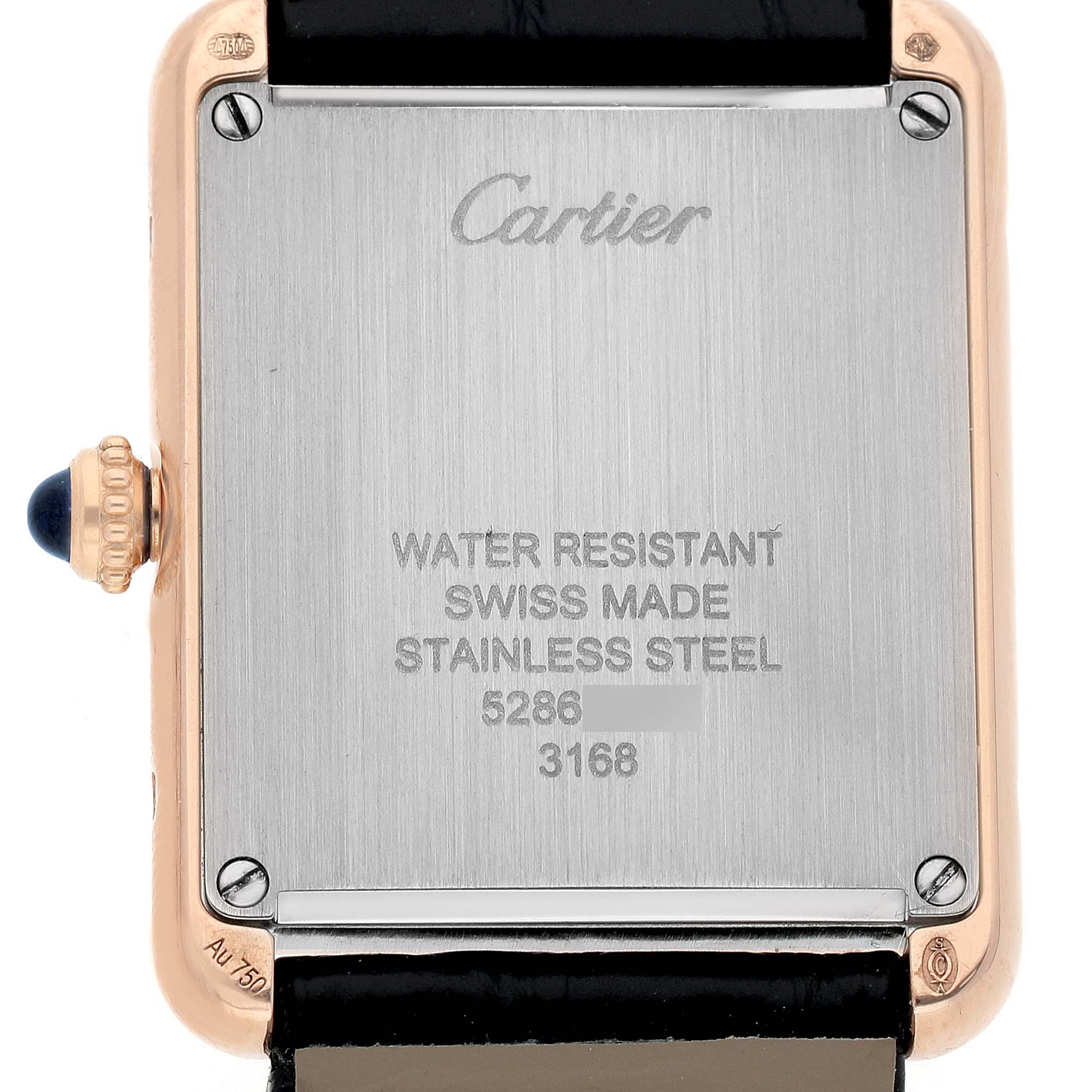 The image shows the back of the Cartier Tank Solo W5200024 Women's Rose Gold Silver Dial watch, featuring the case back and crown with a blue cabochon.
