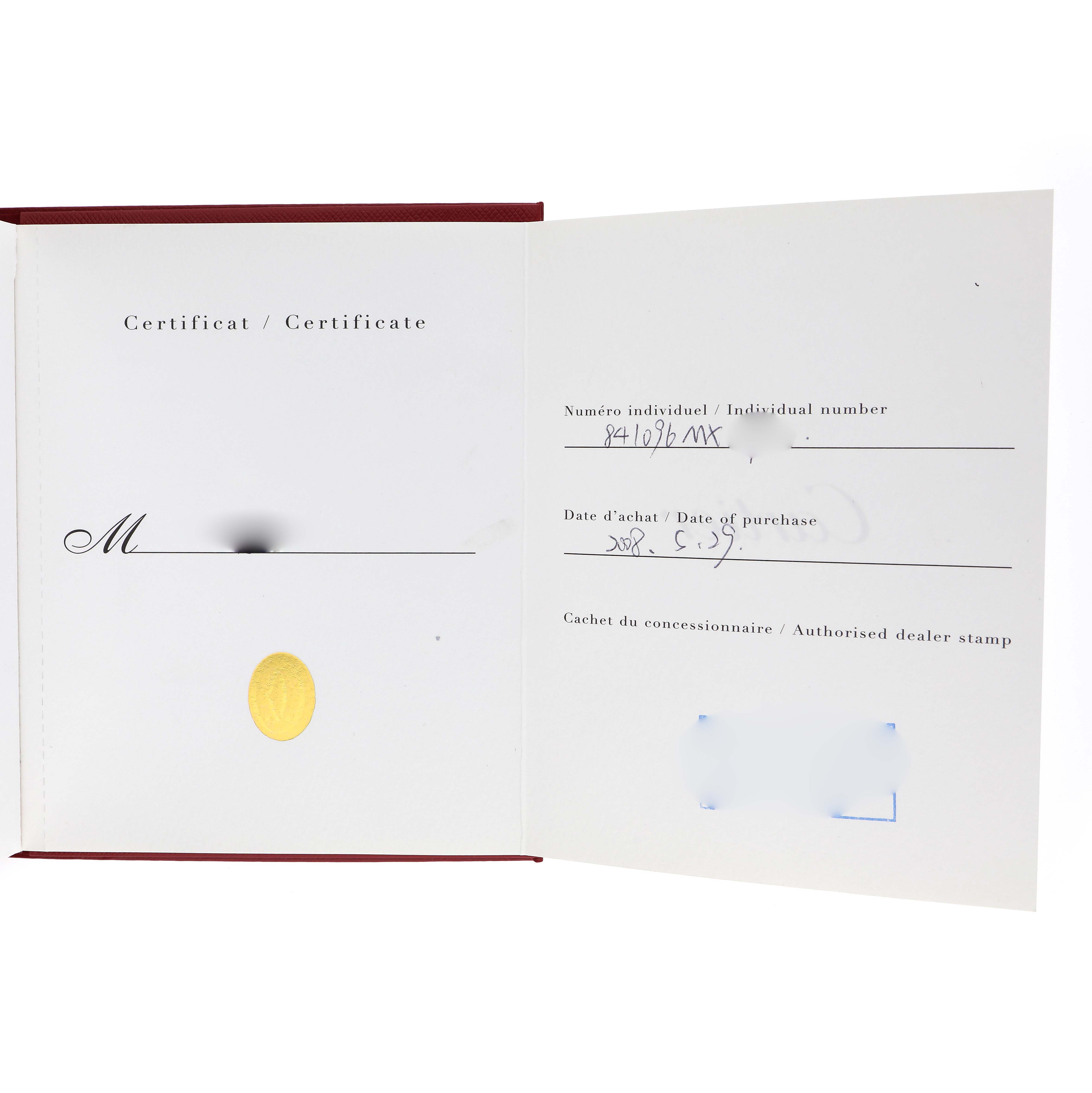 The image shows the open certificate booklet for a Cartier Tank Solo W1018255 Women's Stainless Steel Silver Dial watch, displaying authentication details.