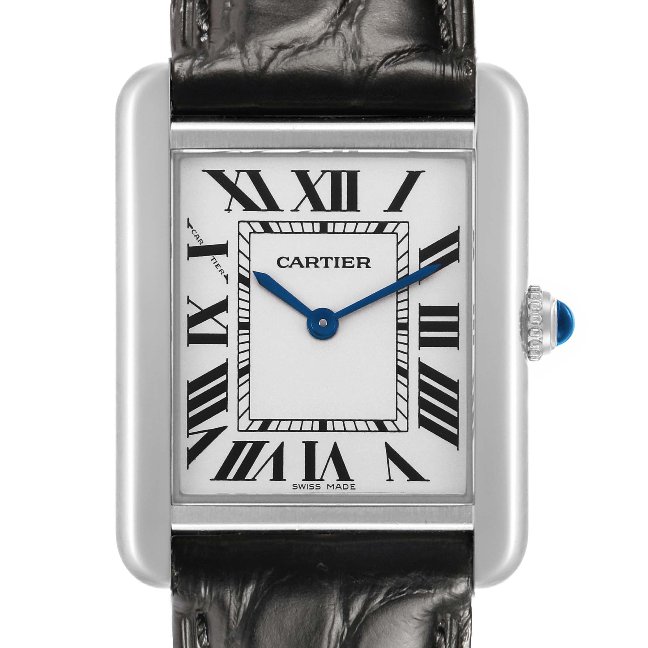 The image shows a frontal view of the Cartier Tank Solo W1018255 Women's Stainless Steel Silver Dial watch, highlighting the dial, Roman numerals, and crown with a blue gem.