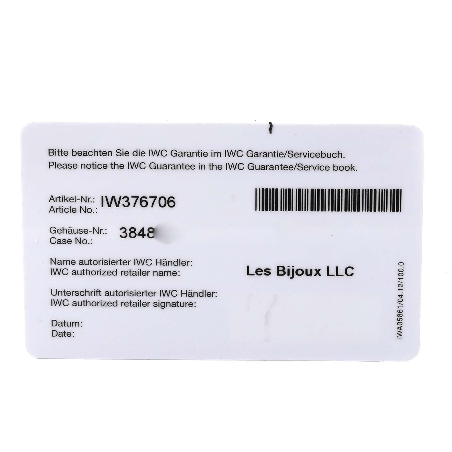 The image shows an IWC guarantee card for the Aquatimer model, displaying article and case numbers along with retailer information.