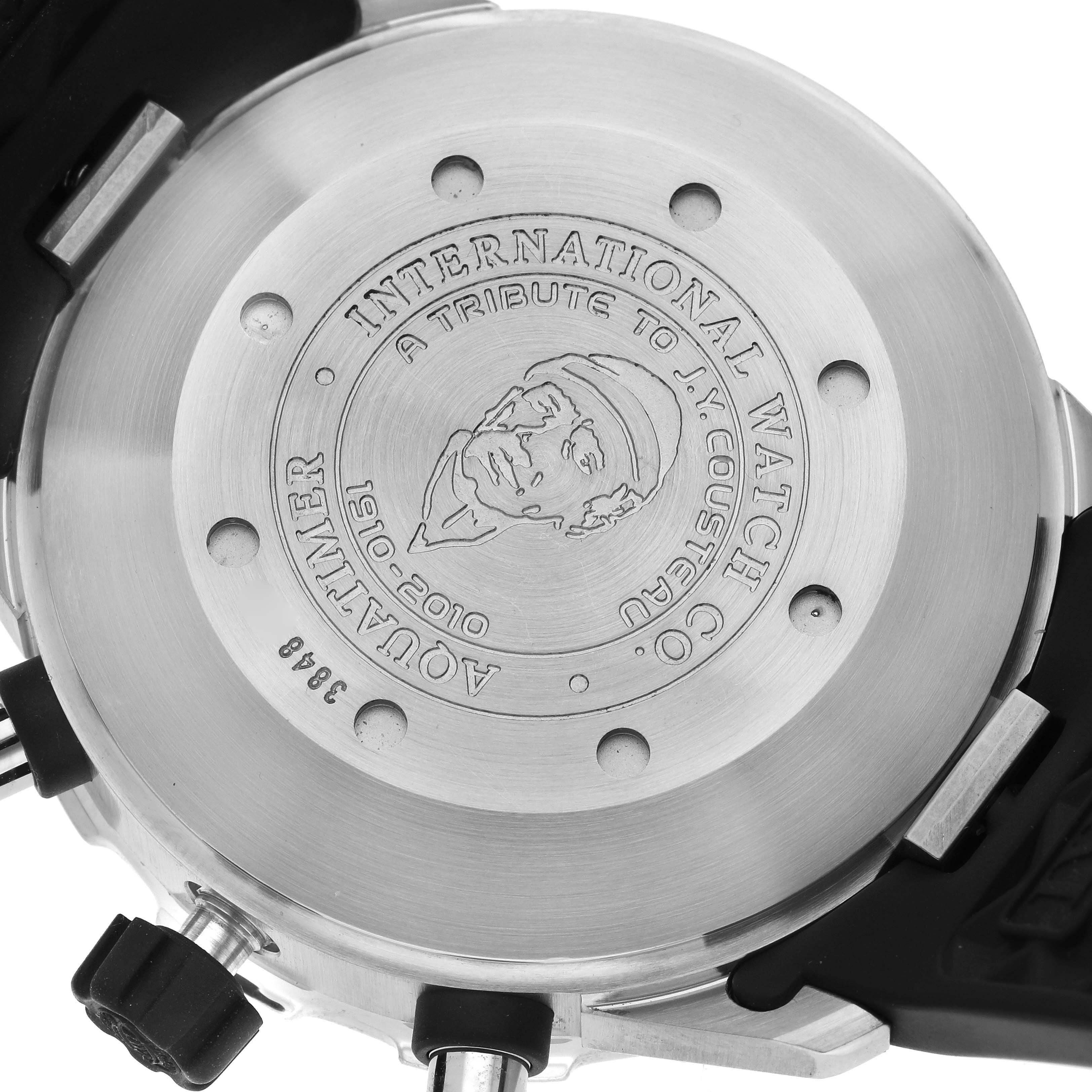 The image shows the back case of an IWC Aquatimer IW376706 Men's Stainless Steel Grey Dial IW376706 Men's Stainless Steel Grey Dial watch, featuring engraved text and a portrait.