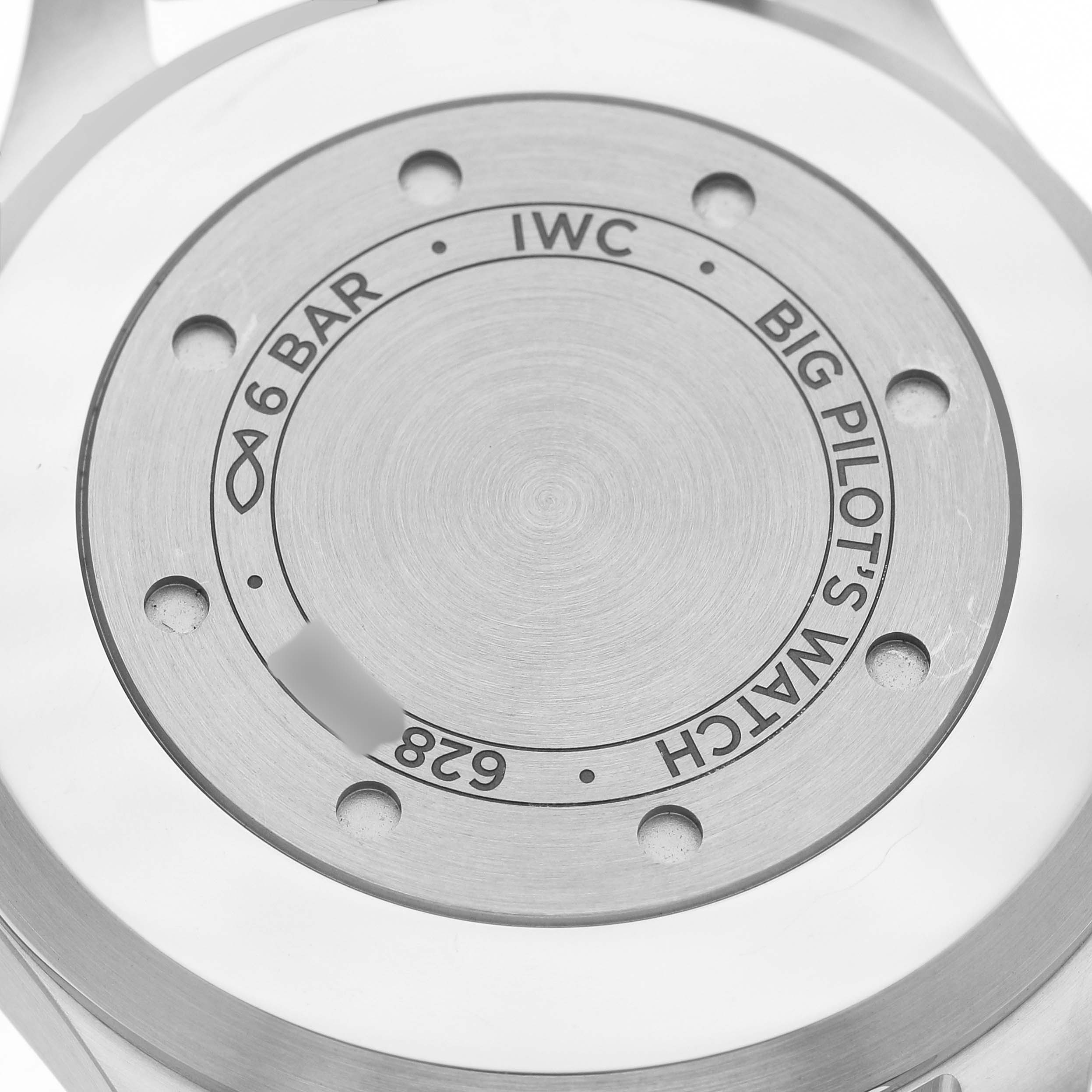 The image shows the back casing of an IWC Big Pilot’s Watch, emphasizing its branding and water resistance markings.
