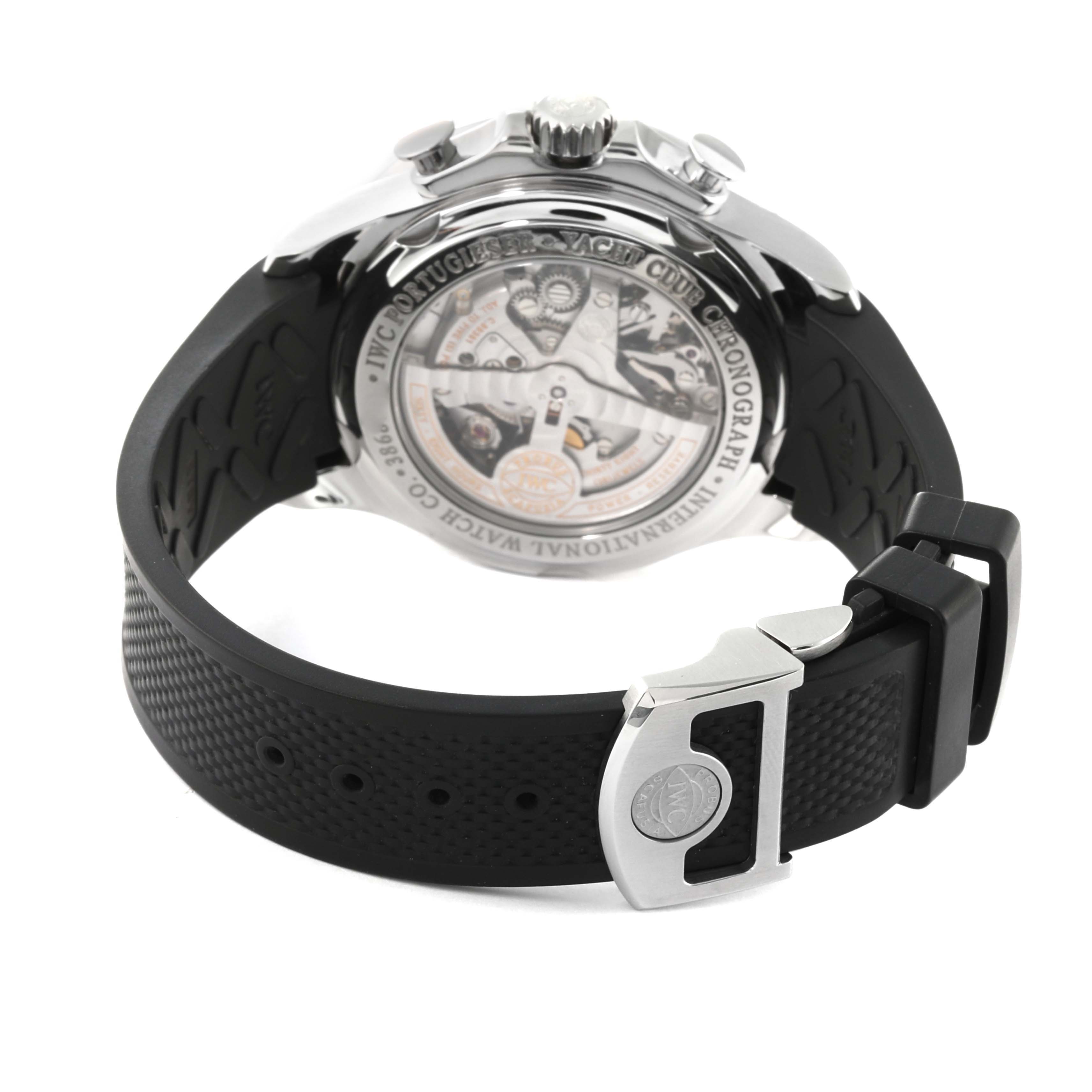 The image shows the back view of an IWC Portuguese IW390211 Men's Stainless Steel Silver Dial IW390211 Men's Stainless Steel Silver Dial model watch, highlighting the case back and rubber strap with buckle.