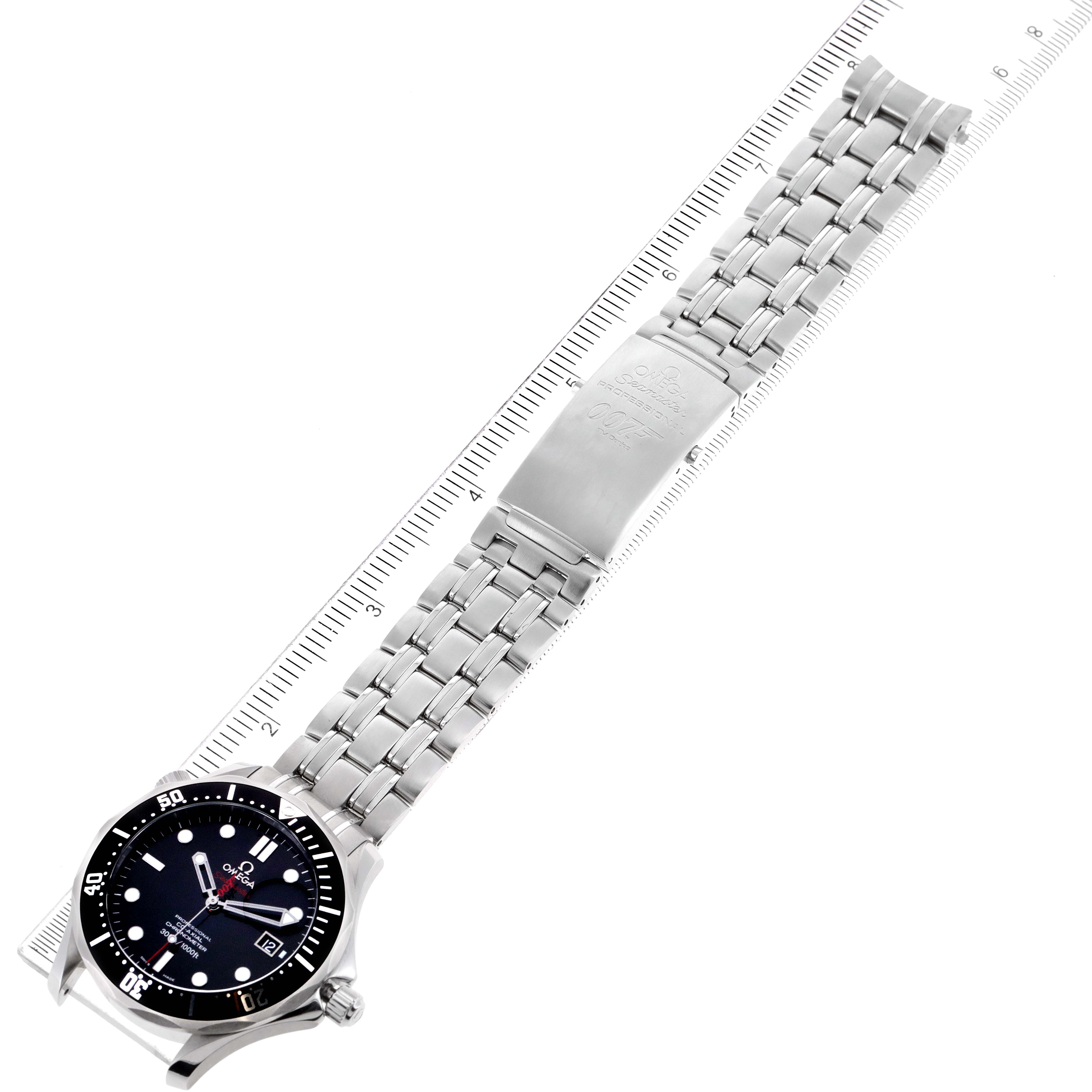 The image shows an Omega Seamaster 212.30.41.20.01.001 Men's Stainless Steel Black Dial 212.30.41.20.01.001 Men's Stainless Steel Black Dial watch laid flat with a ruler for size reference, highlighting the face and metal bracelet.