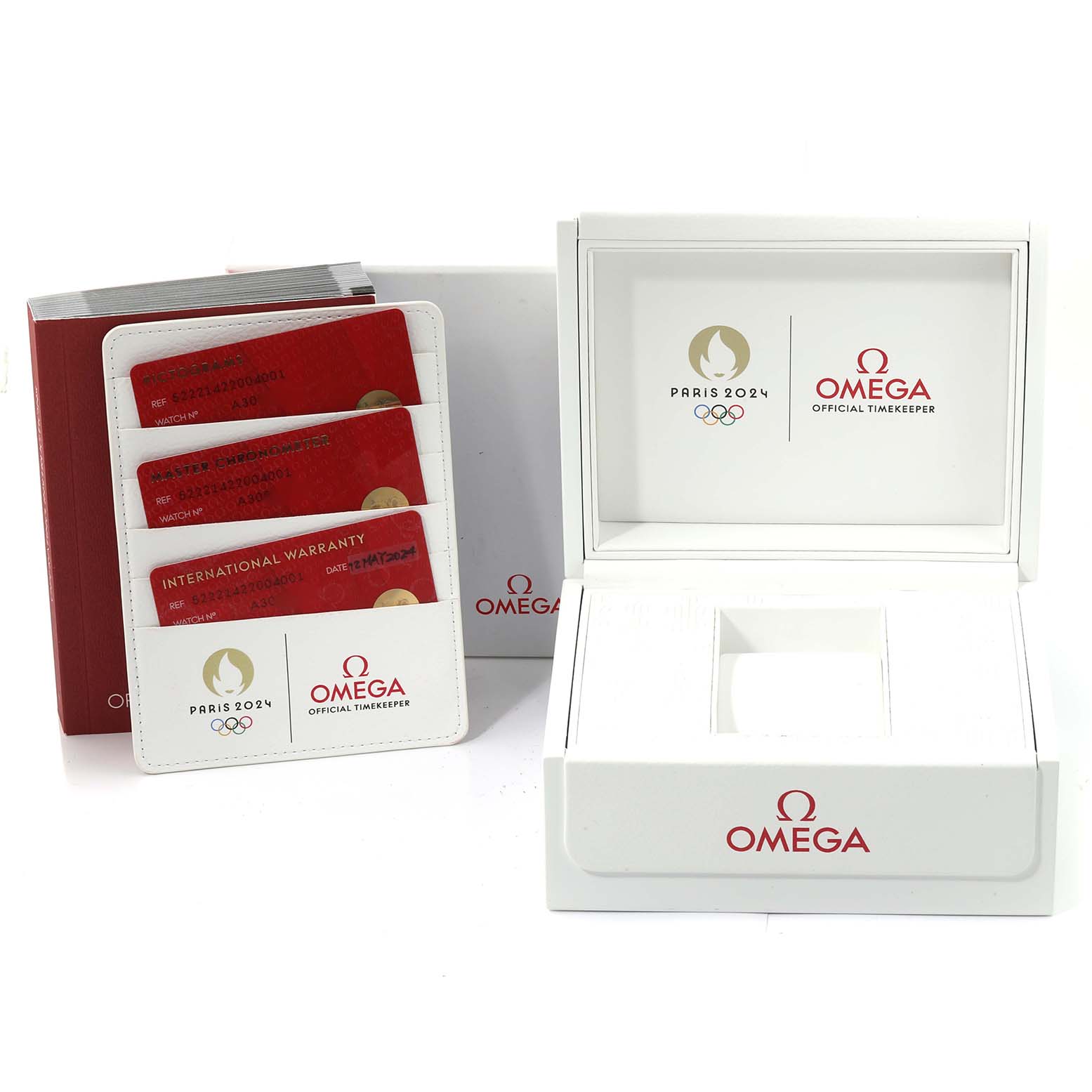 The image shows the Omega Seamaster 522.21.42.20.04.001 Men's Steel and Gold (two tone) White Dial 522.21.42.20.04.001 Men's Steel and Gold (two tone) White Dial's packaging, including warranty cards, an open watch box, and branded booklets.